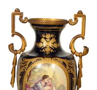 A Pair Gilt Metal Mounted Sèvres Style Porcelain Urns