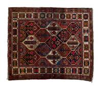 A Kazak Wool Rug 5 feet x 4 feet 4 inches.