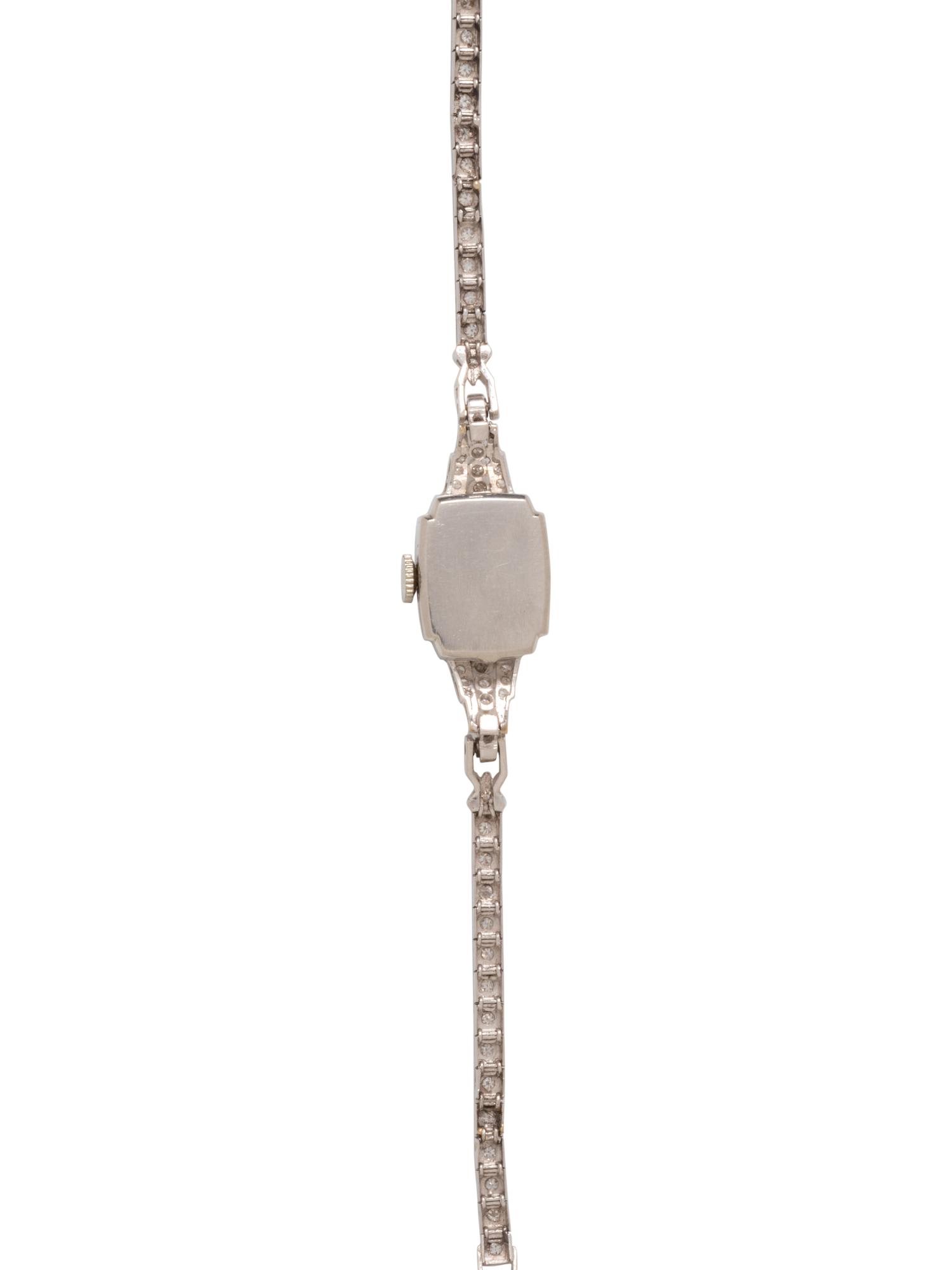 GIRARD PERREGAUX, PLATINUM AND DIAMOND WATCH