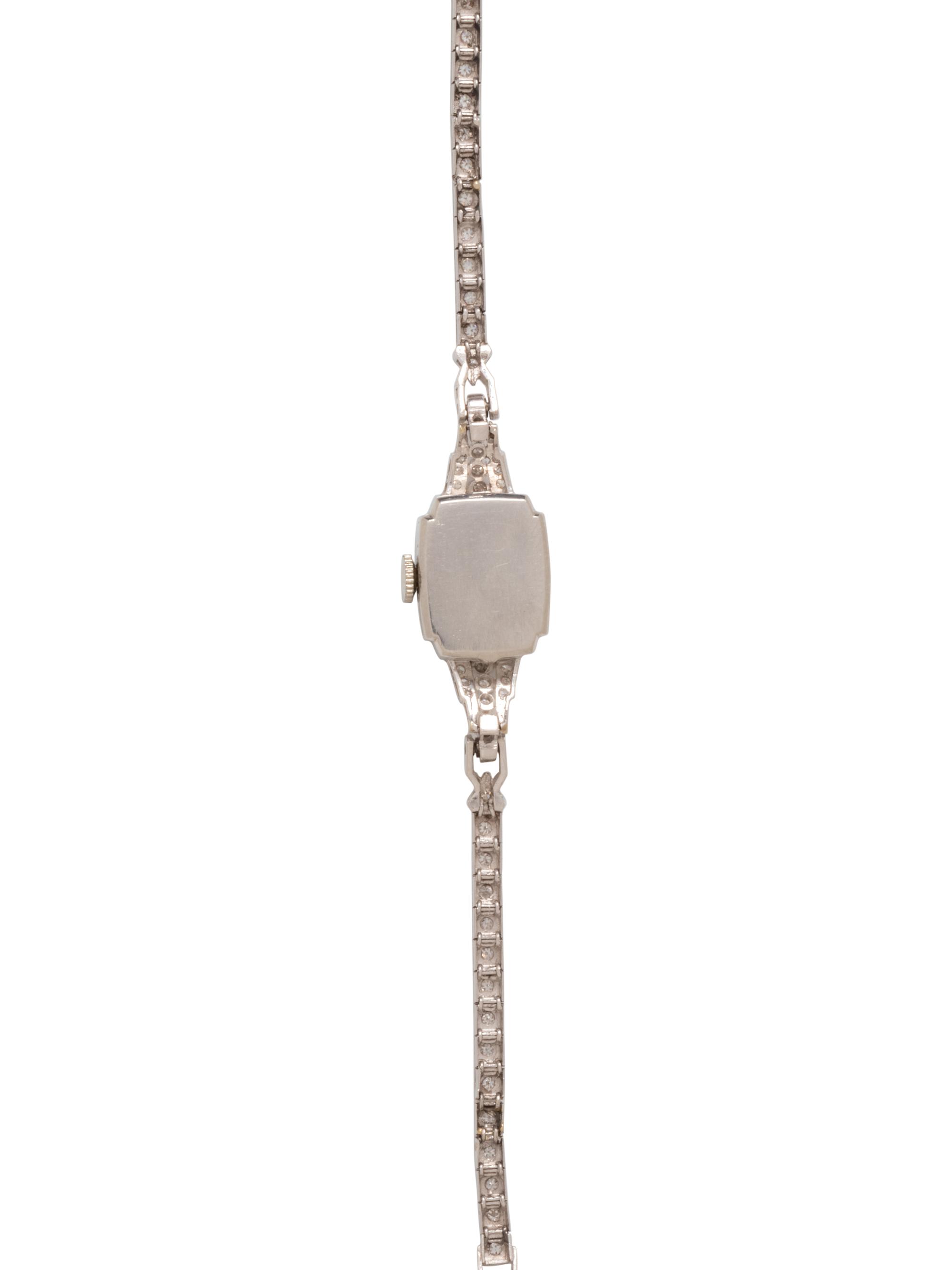 GIRARD PERREGAUX, PLATINUM AND DIAMOND WATCH