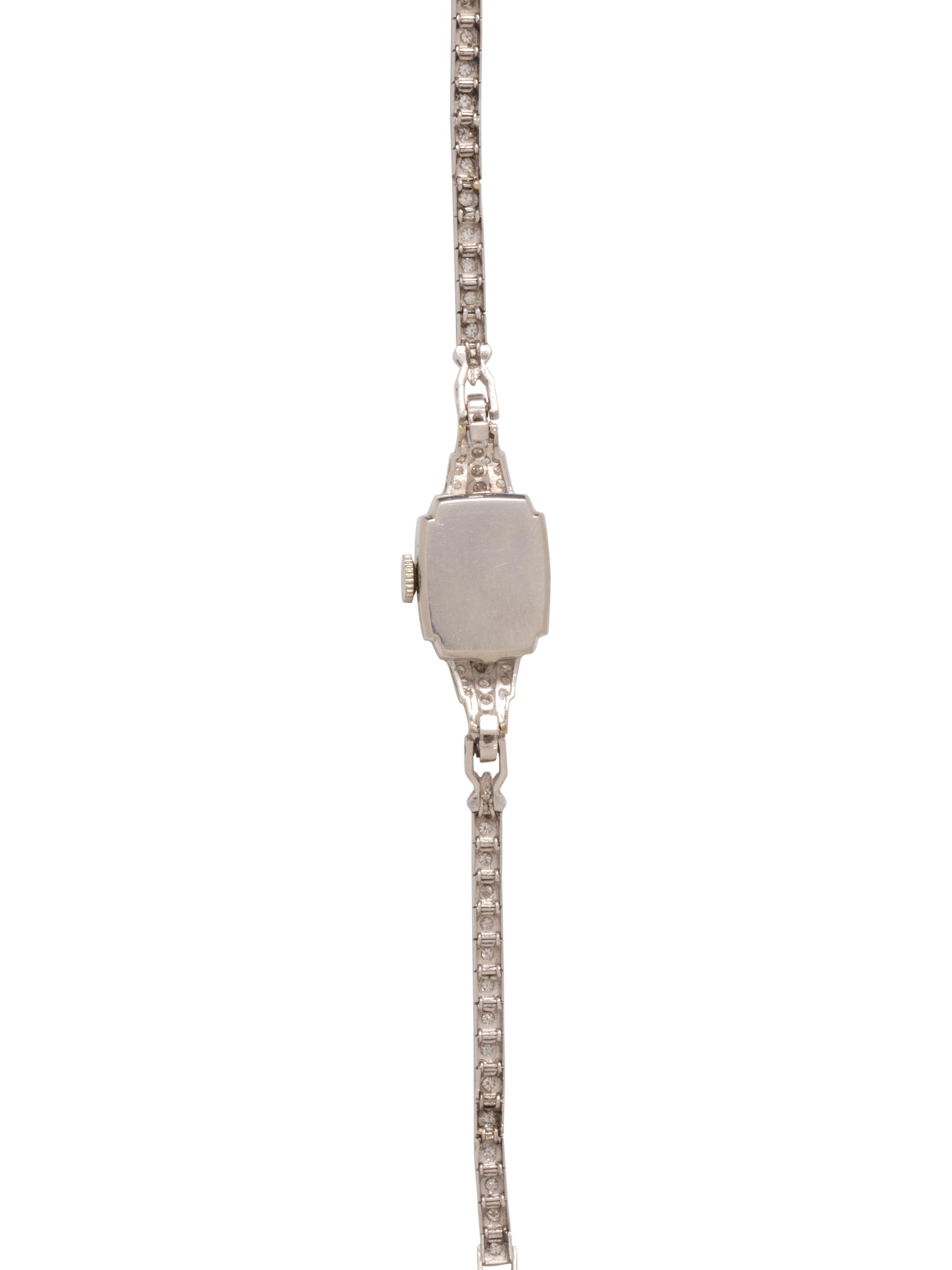 GIRARD PERREGAUX, PLATINUM AND DIAMOND WATCH