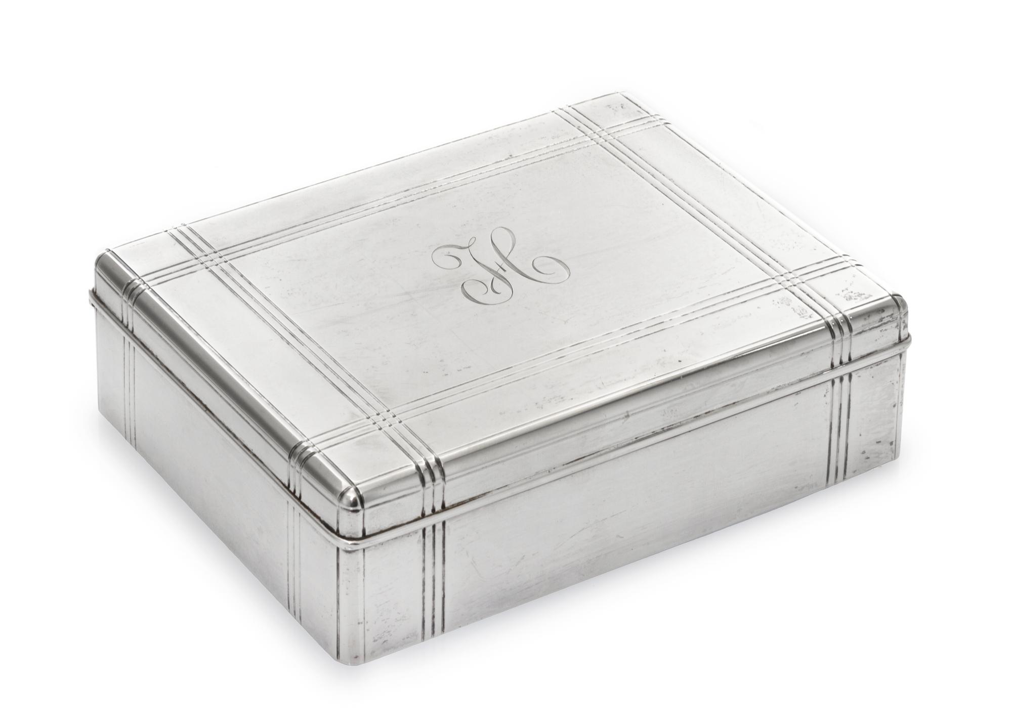 An American Silver Cigarette Box, Tiffany & Co, New York, NY, 1930, rectangular with incised bands, the cover engraved with initial H,
