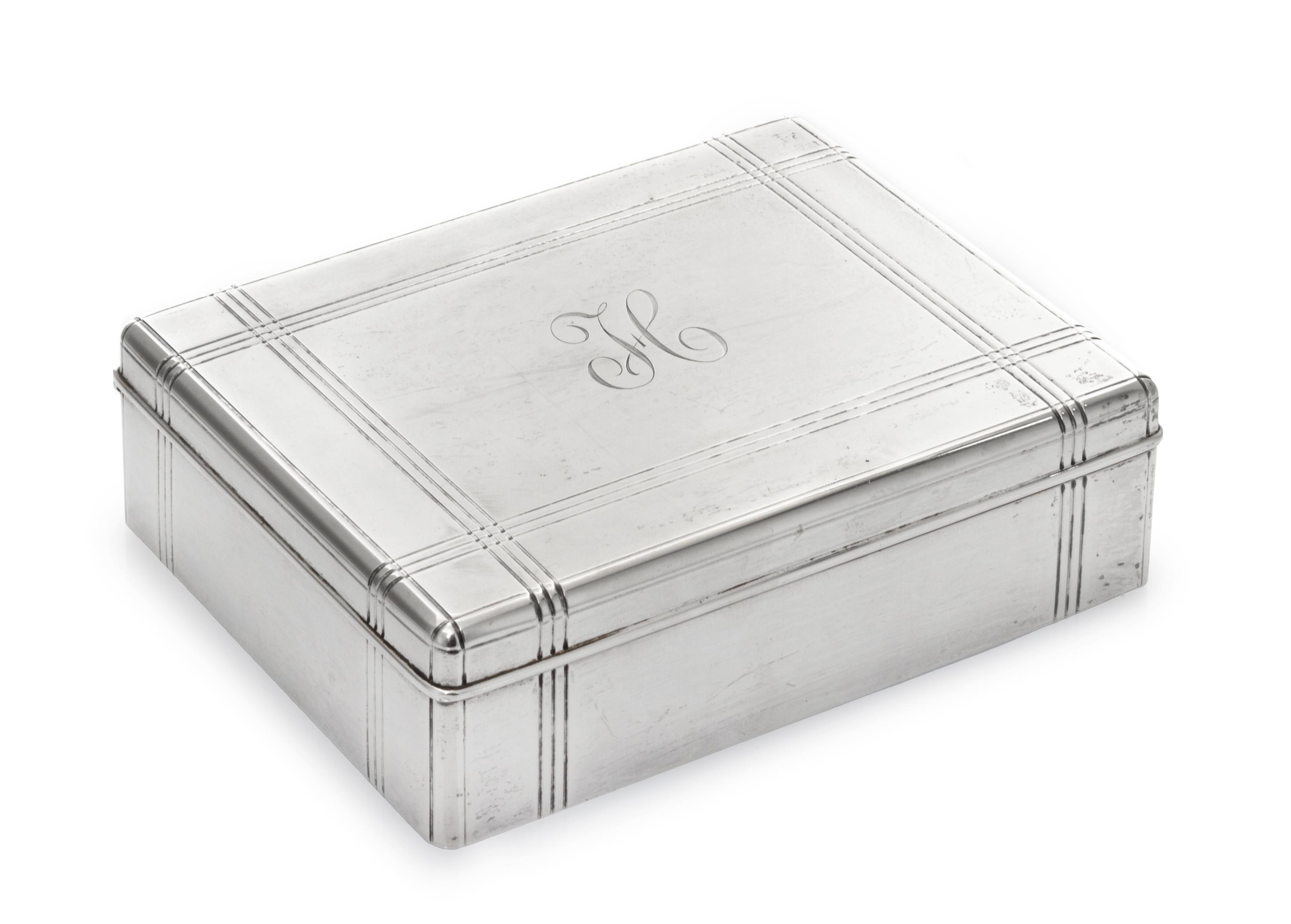An American Silver Cigarette Box, Tiffany & Co, New York, NY, 1930, rectangular with incised bands, the cover engraved with initial H,