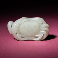 A Chinese White Jade Carving of a Crab on Lotus Leaf, 18th/19th Century — 清中期 白玉蓮葉螃蟹把件