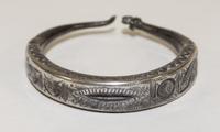 A Middle Eastern Silver Bangle Diameter of exterior 3 inches.