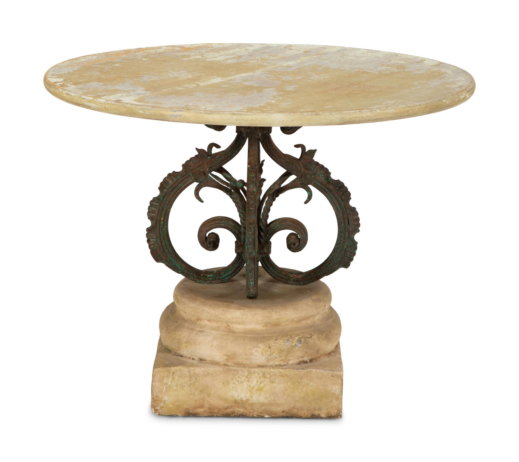 A Bronze and Stone Table with an Inlaid Stone Top