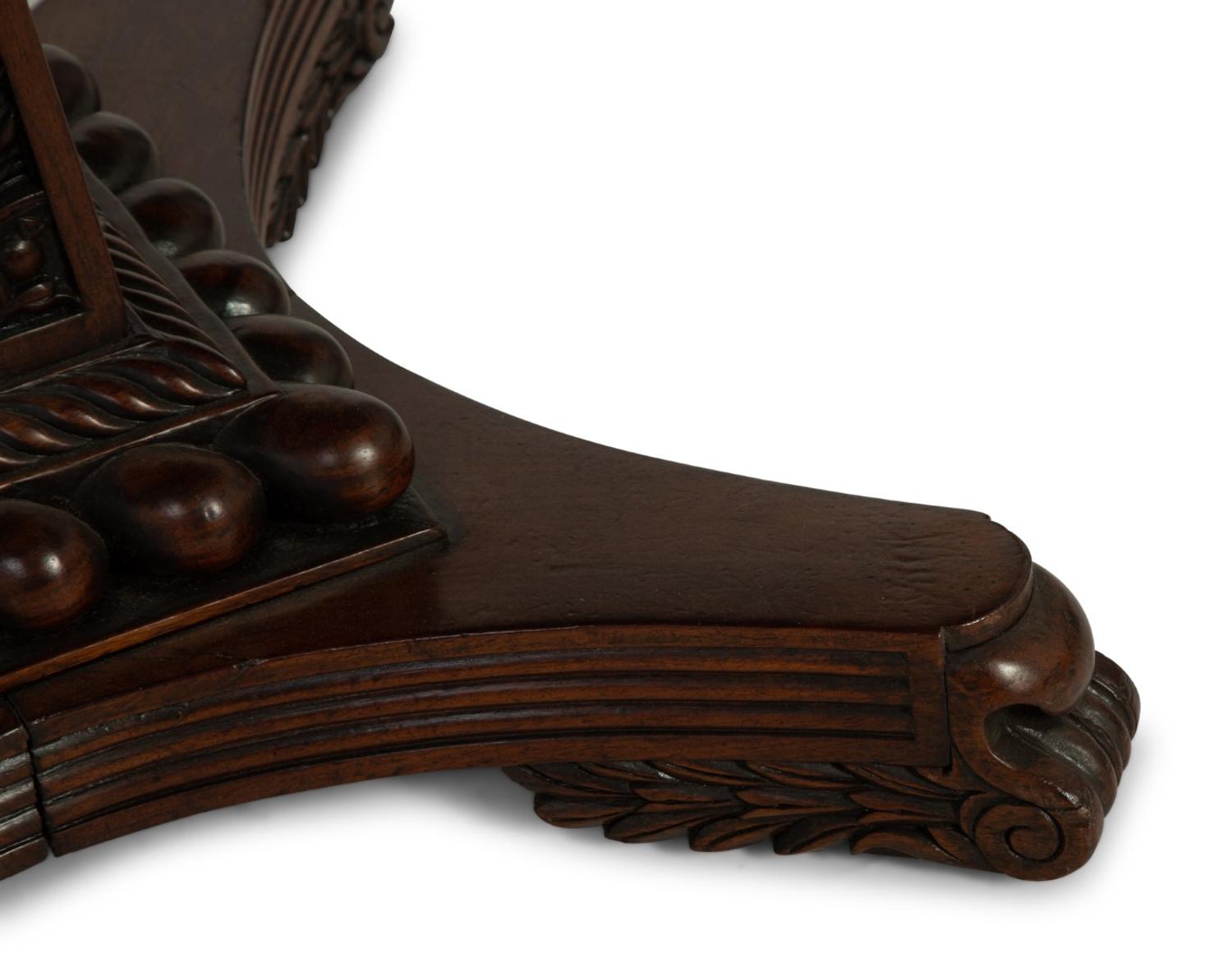 An Anglo-Indian Carved Padouk Wood Tilt Top Center Table — 19TH CENTURY