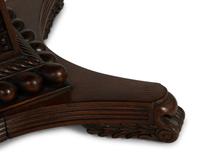 An Anglo-Indian Carved Padouk Wood Tilt Top Center Table — 19TH CENTURY