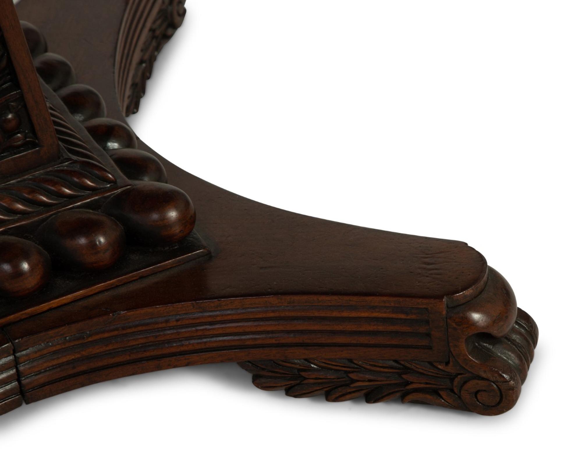 An Anglo-Indian Carved Padouk Wood Tilt Top Center Table — 19TH CENTURY
