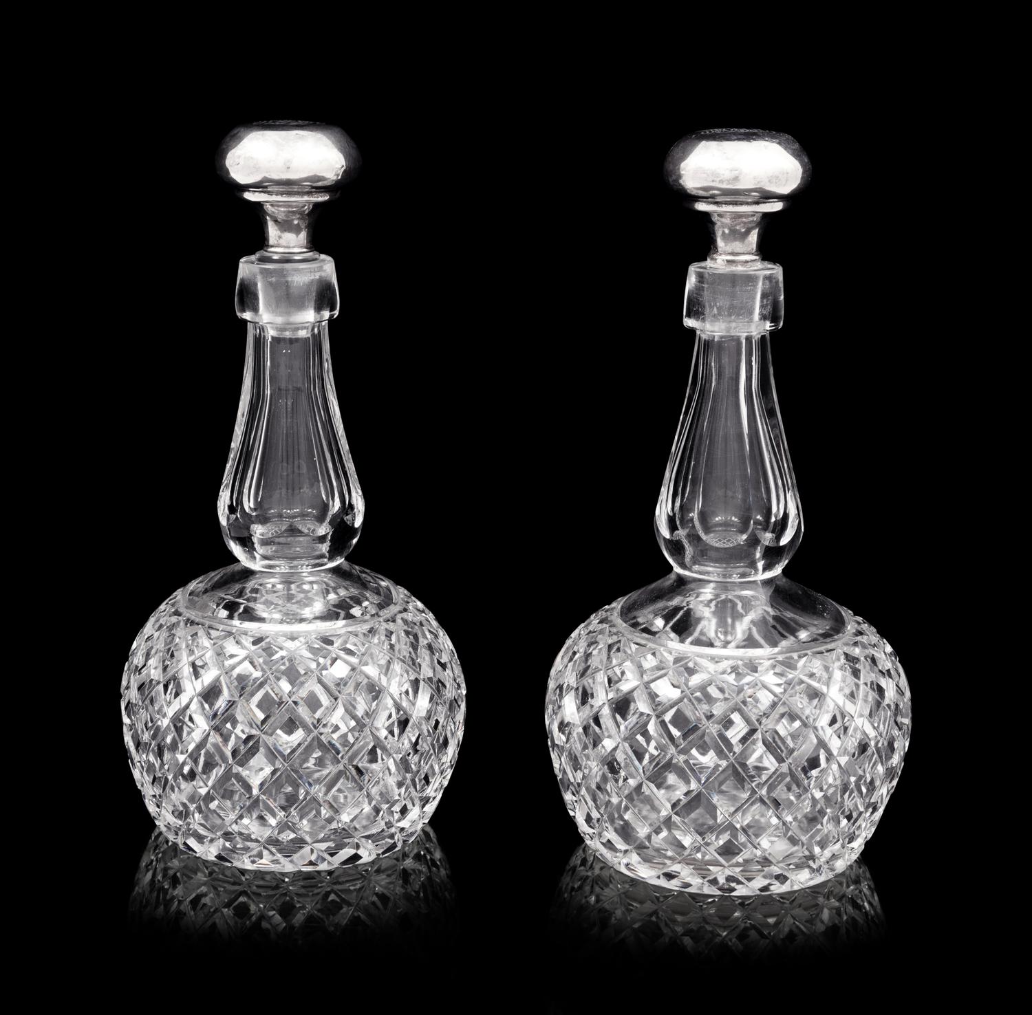 A Pair of American Cut Glass Decanters with Silver Stoppers