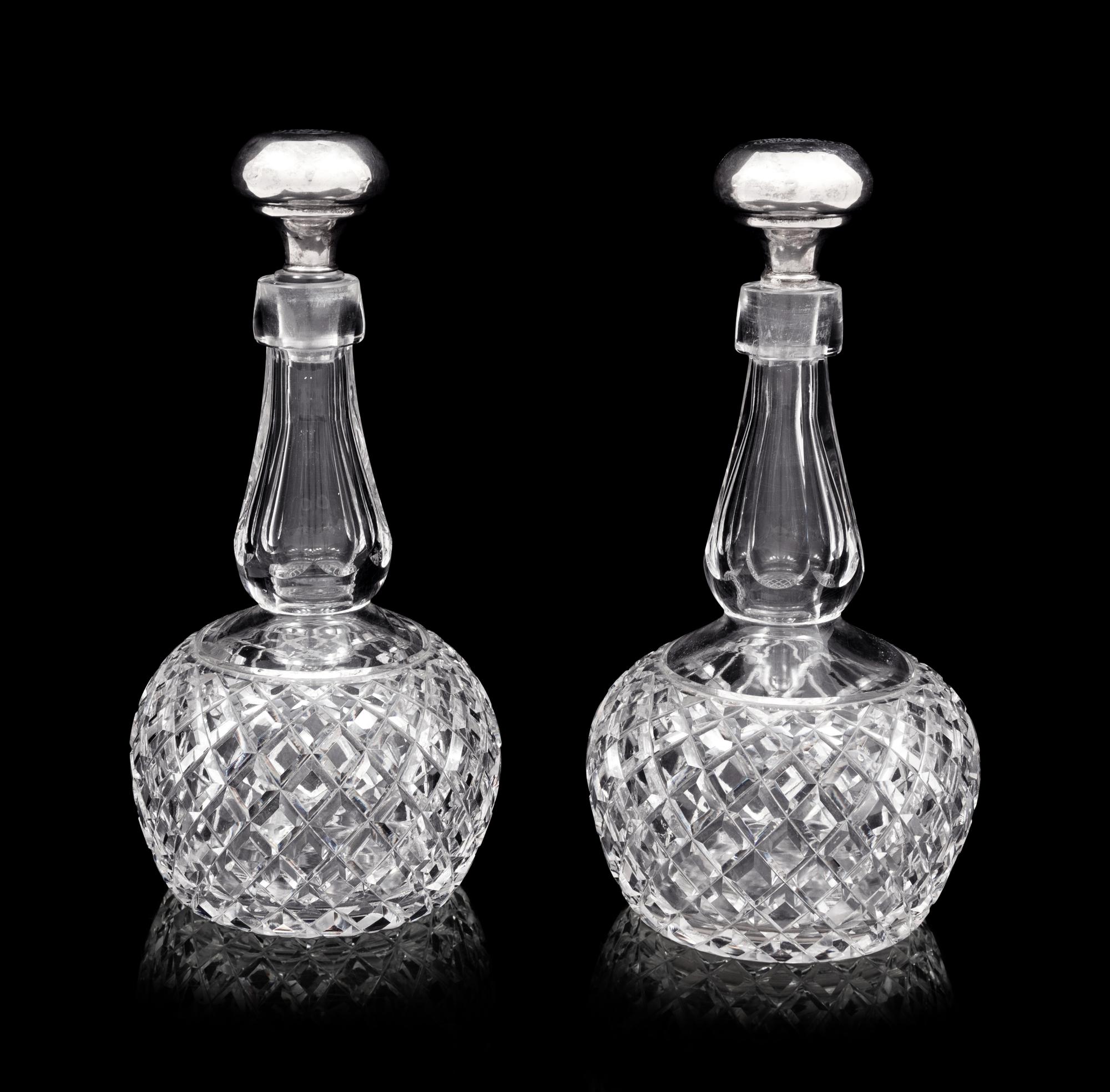 A Pair of American Cut Glass Decanters with Silver Stoppers