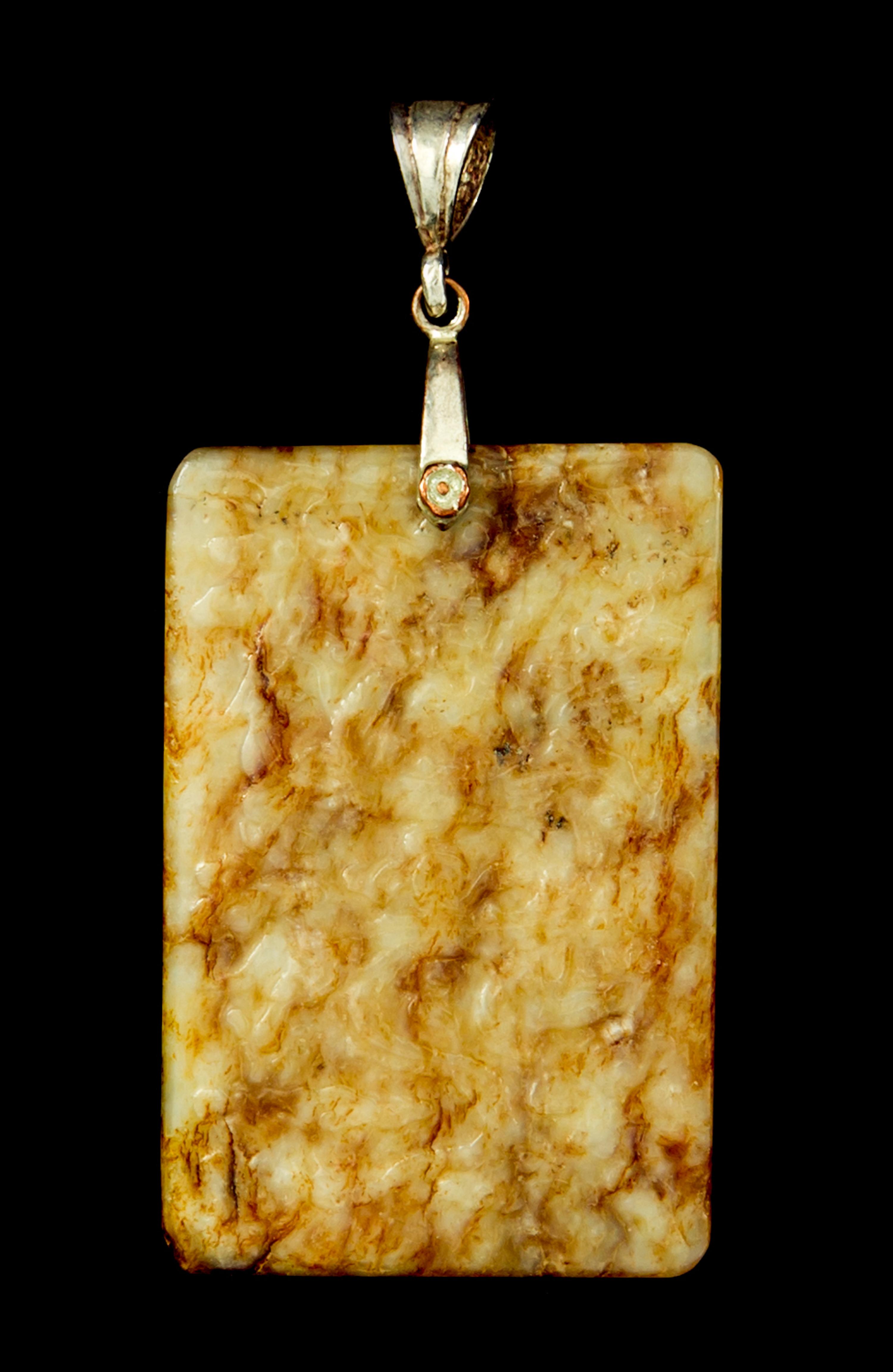 Two Jade Articles Length of first 2 1/2 inches.