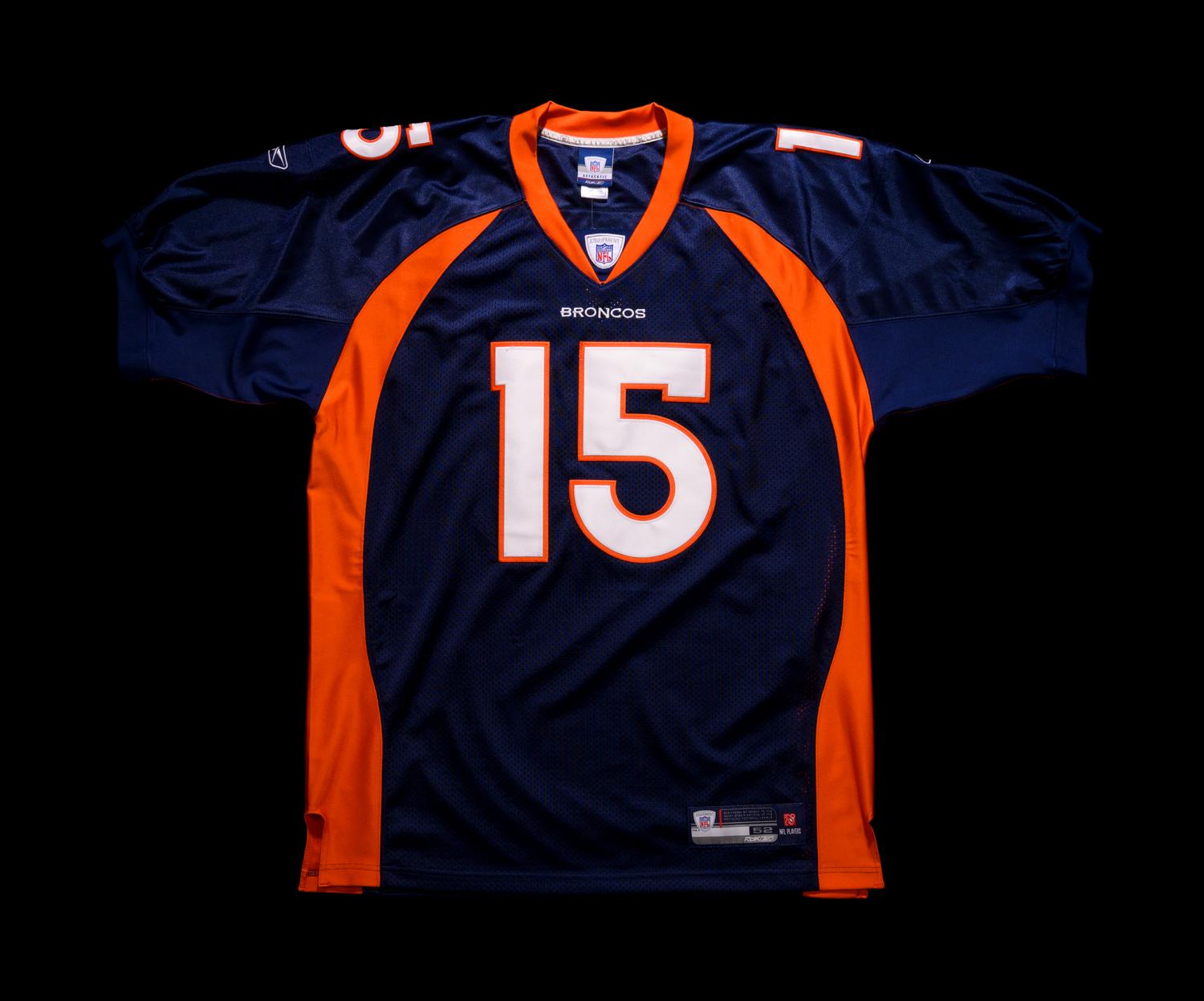 A Group of Denver Broncos Items (Including Tim Tebow),