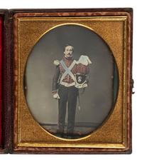 [MILITARIA]. [BRADY, M., photog.]. Sixth plate daguerreotype of a militiaman holding a plumed shako.