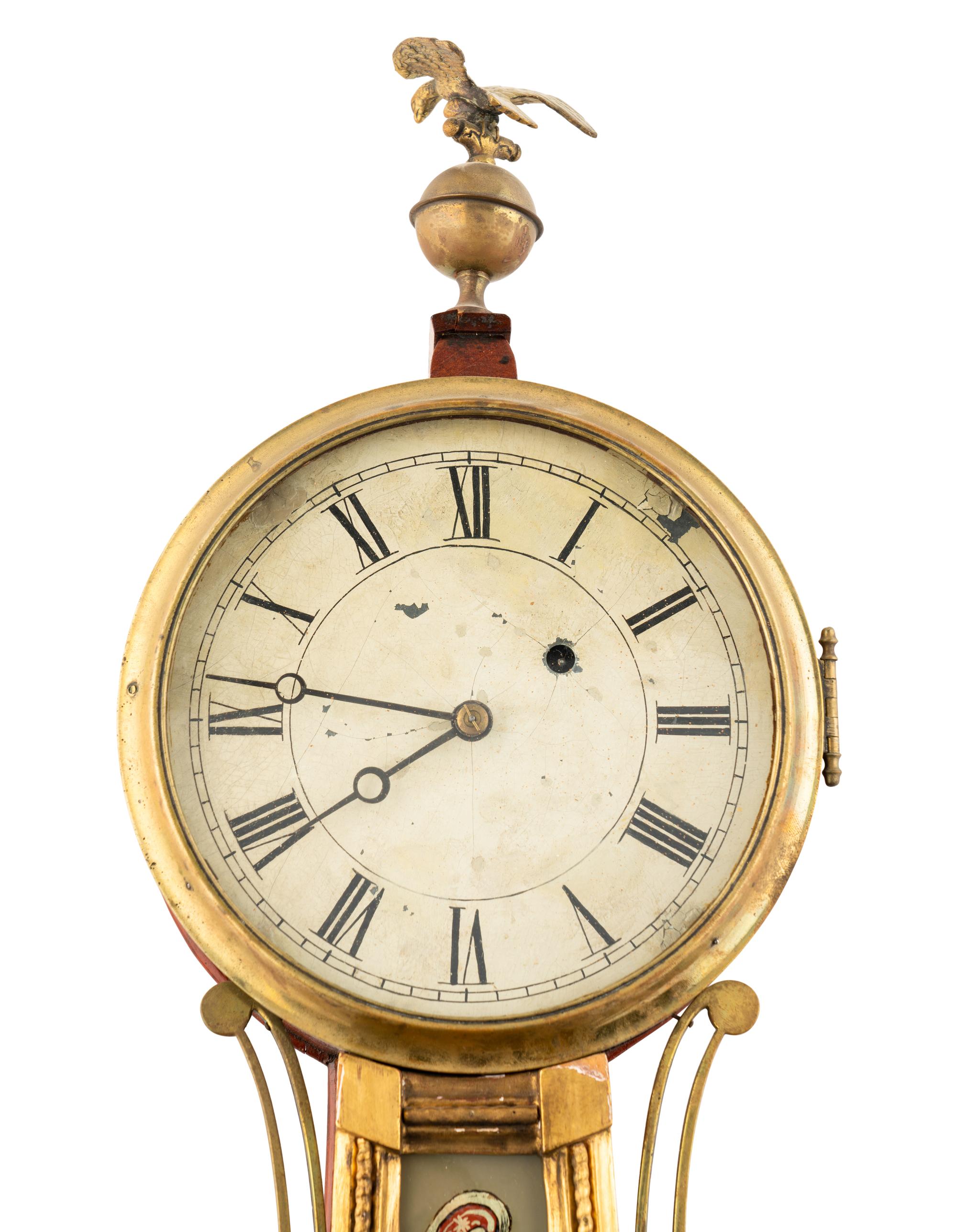An Federal Parcel-Gilt and Eglomise Decorated Banjo Clock