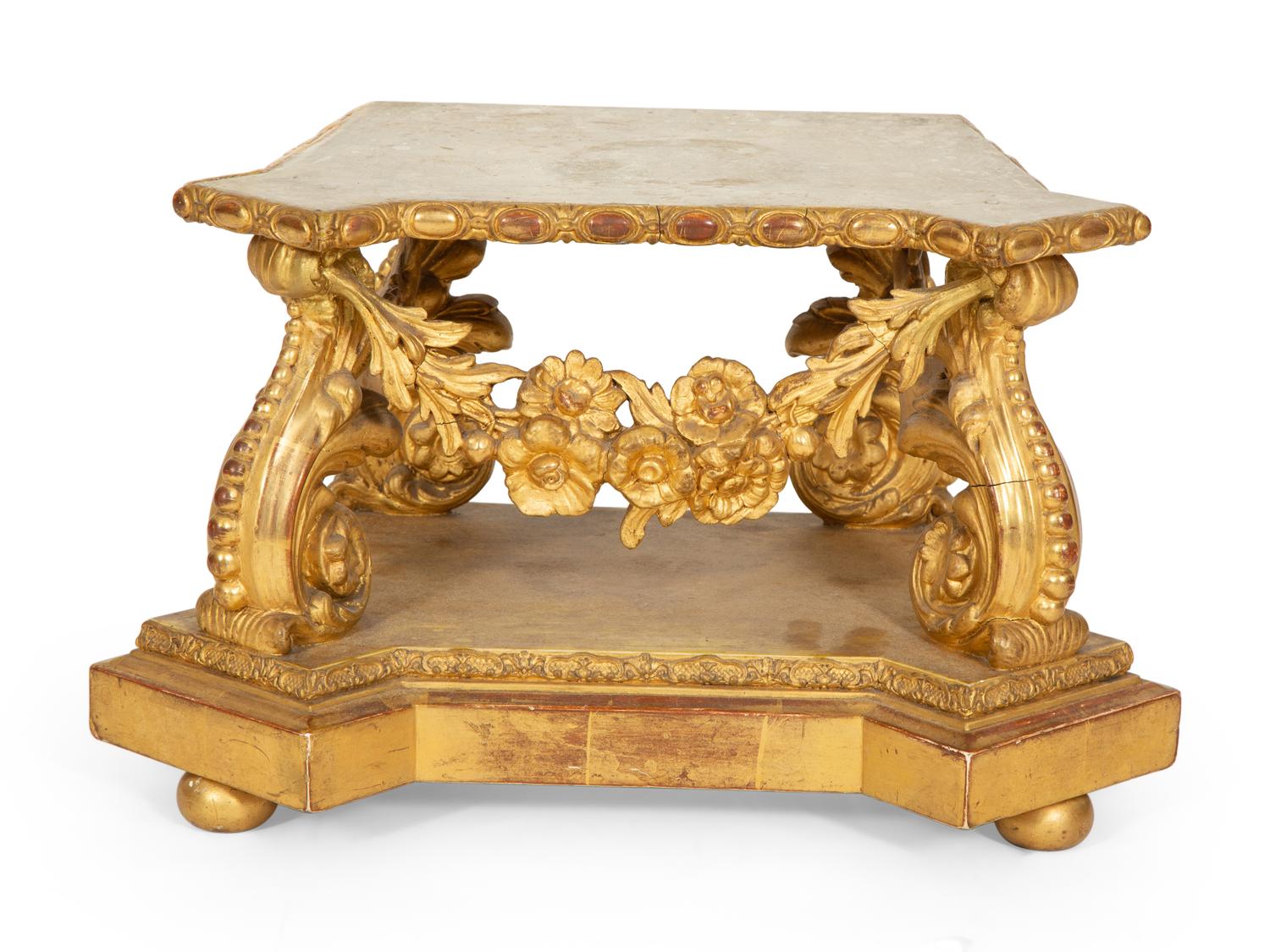 A Georgian Carved, Painted and Parcel Gilt Shaped Pedestal Base