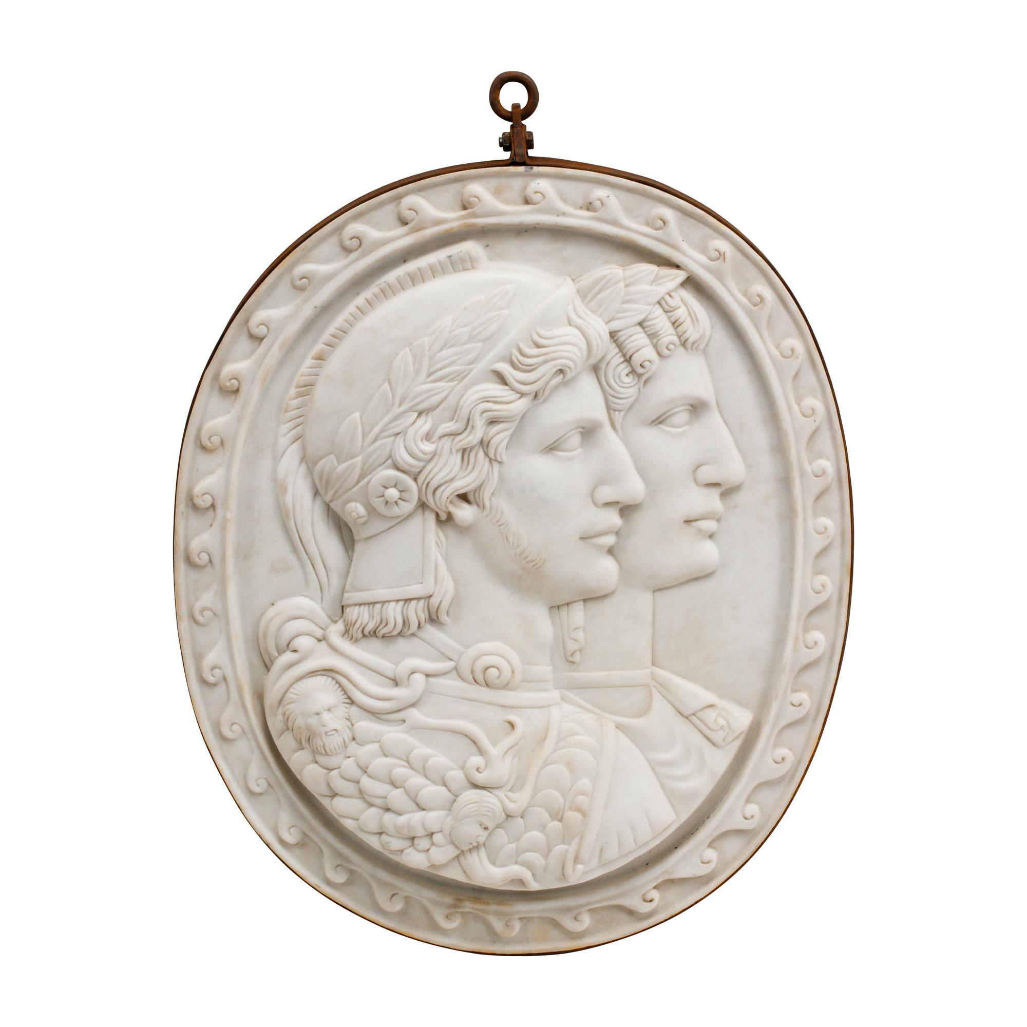 An Italian Carved Marble and Iron Mounted Double Profile Plaque