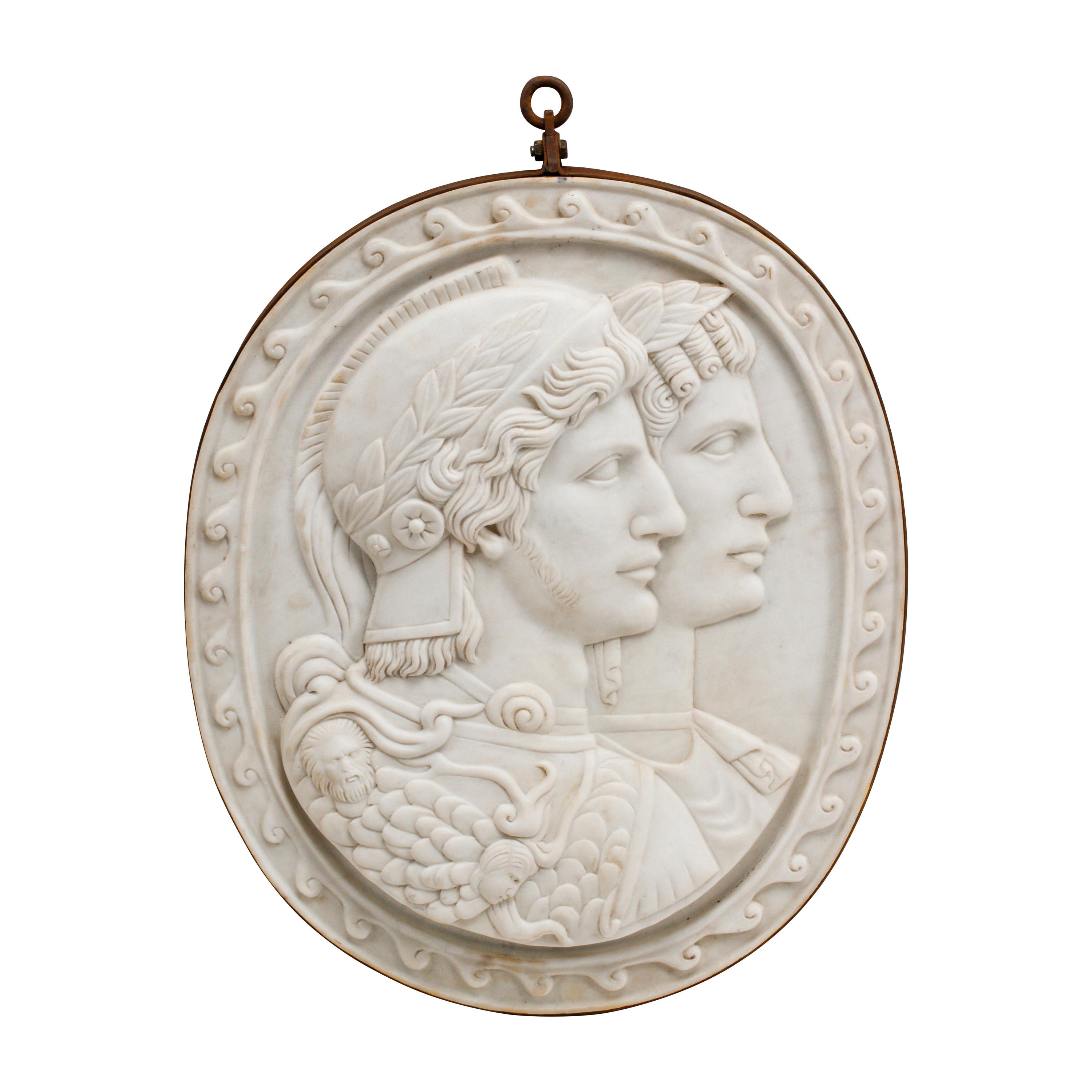 An Italian Carved Marble and Iron Mounted Double Profile Plaque