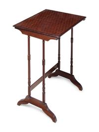 A Set of Three Regency Style Satinwood Inlaid Mahogany and Parquetry Nesting Tables