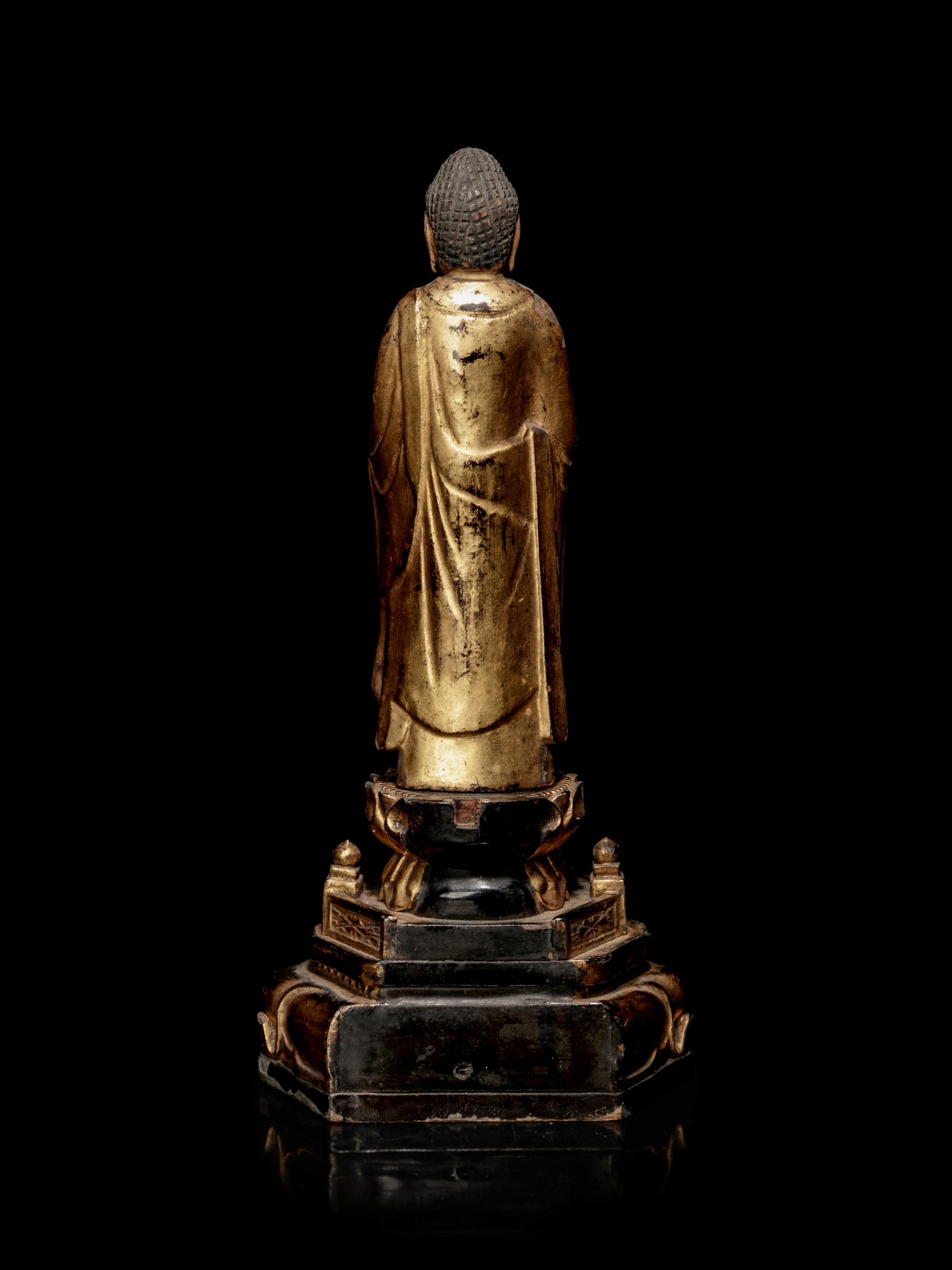 A Hardwood Shrine with a Gilt Wood Figure of Buddha