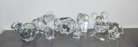 A Collection of Nine Glass Elephant Figures Height of tallest 8 1/2 inches.