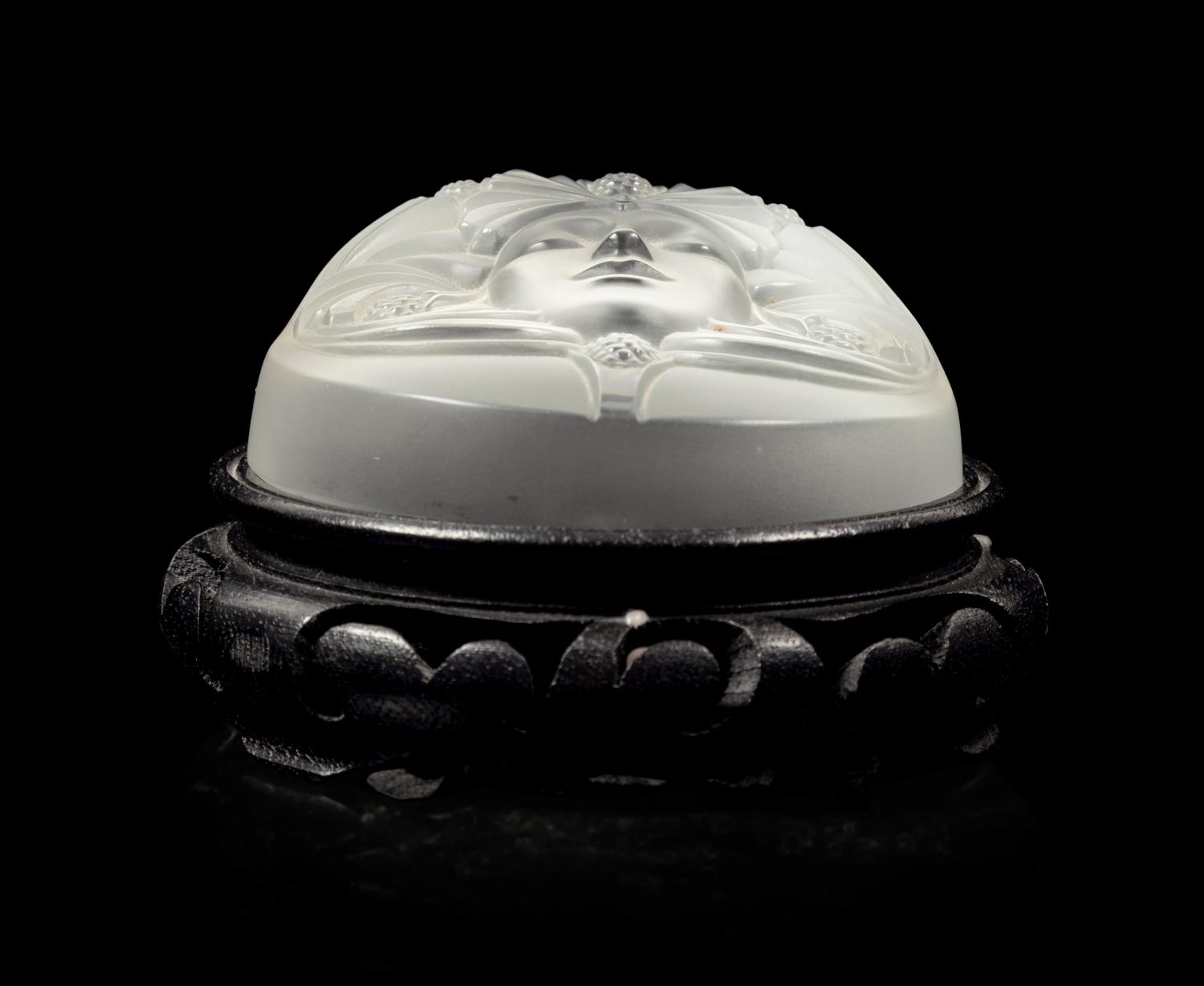 A Lalique Psyche Paperweight