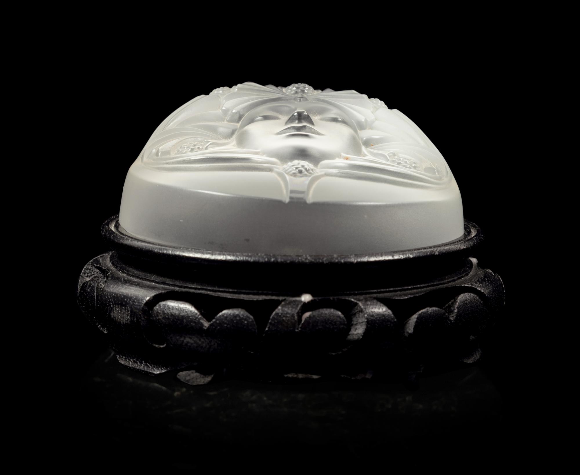 A Lalique Psyche Paperweight
