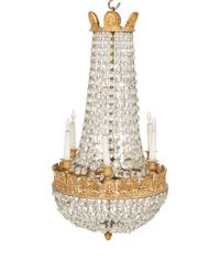 An Empire Style Gilt Metal and Cut Glass Six-Light Chandelier