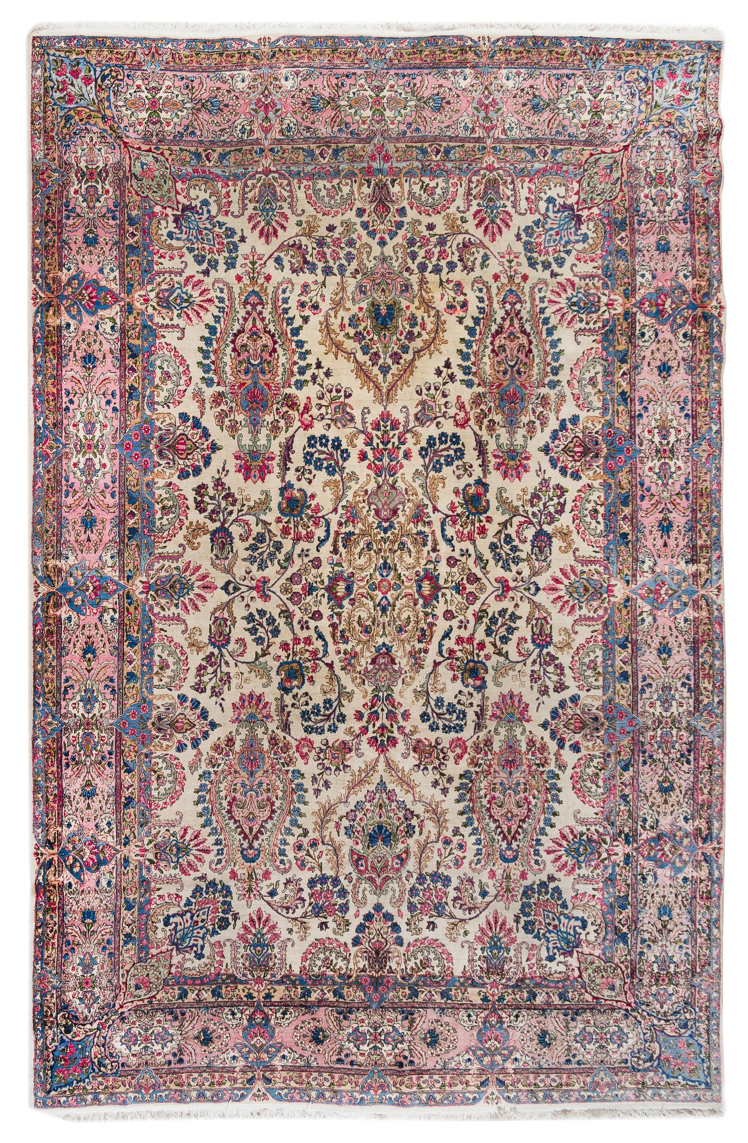 A Kirman Wool Rug 13 feet 6 inches x 9 feet 8 inches. — FIRST HALF 20TH CENTURY