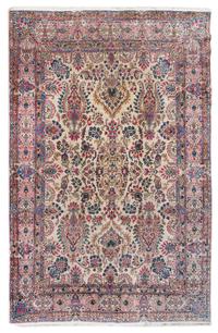 A Kirman Wool Rug 13 feet 6 inches x 9 feet 8 inches. — FIRST HALF 20TH CENTURY