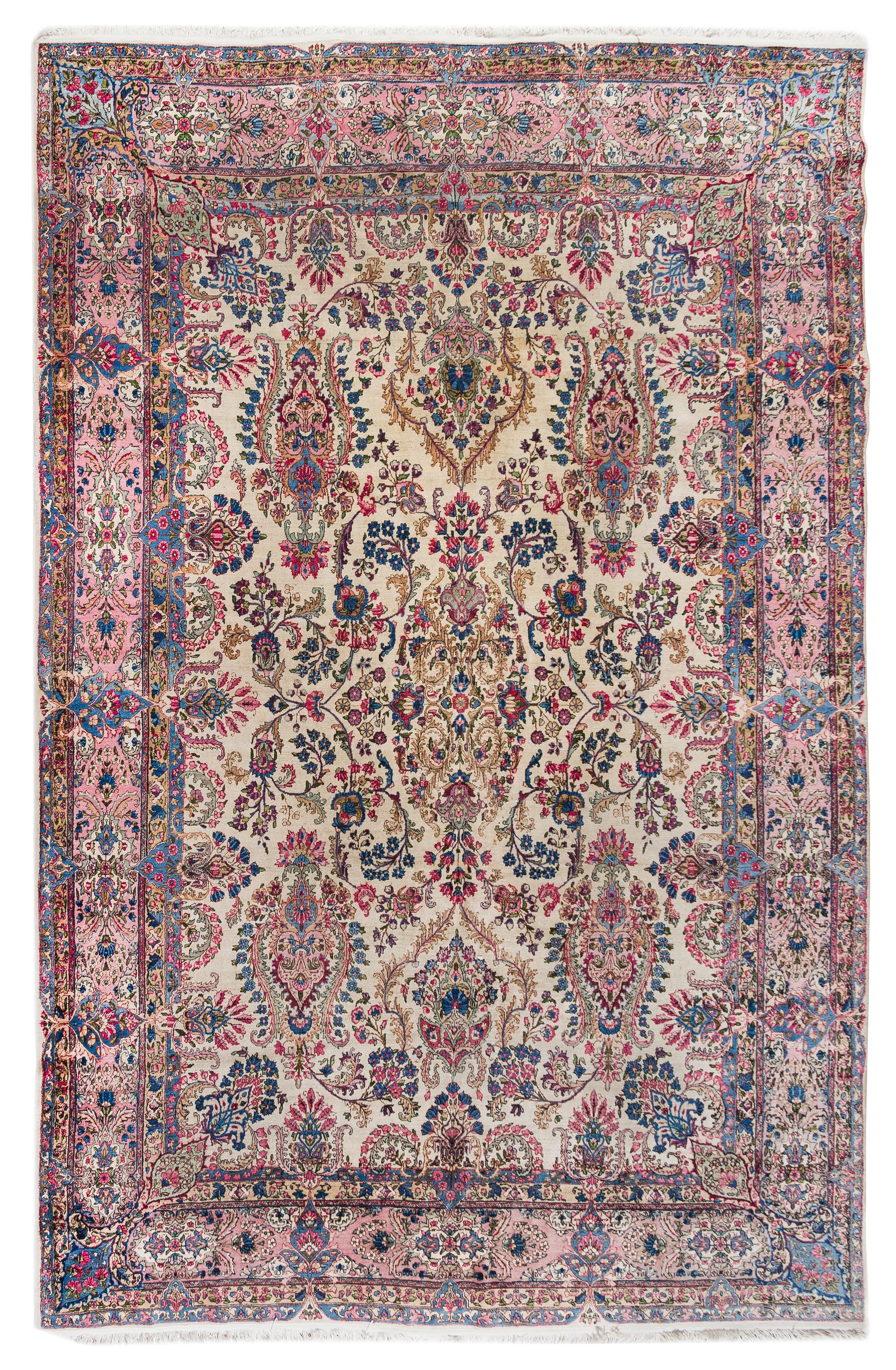 A Kirman Wool Rug 13 feet 6 inches x 9 feet 8 inches. — FIRST HALF 20TH CENTURY