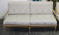 A Pair of Vintage Painted Iron Settees. Height 31 x width 69 x depth 31 1/2 inches.