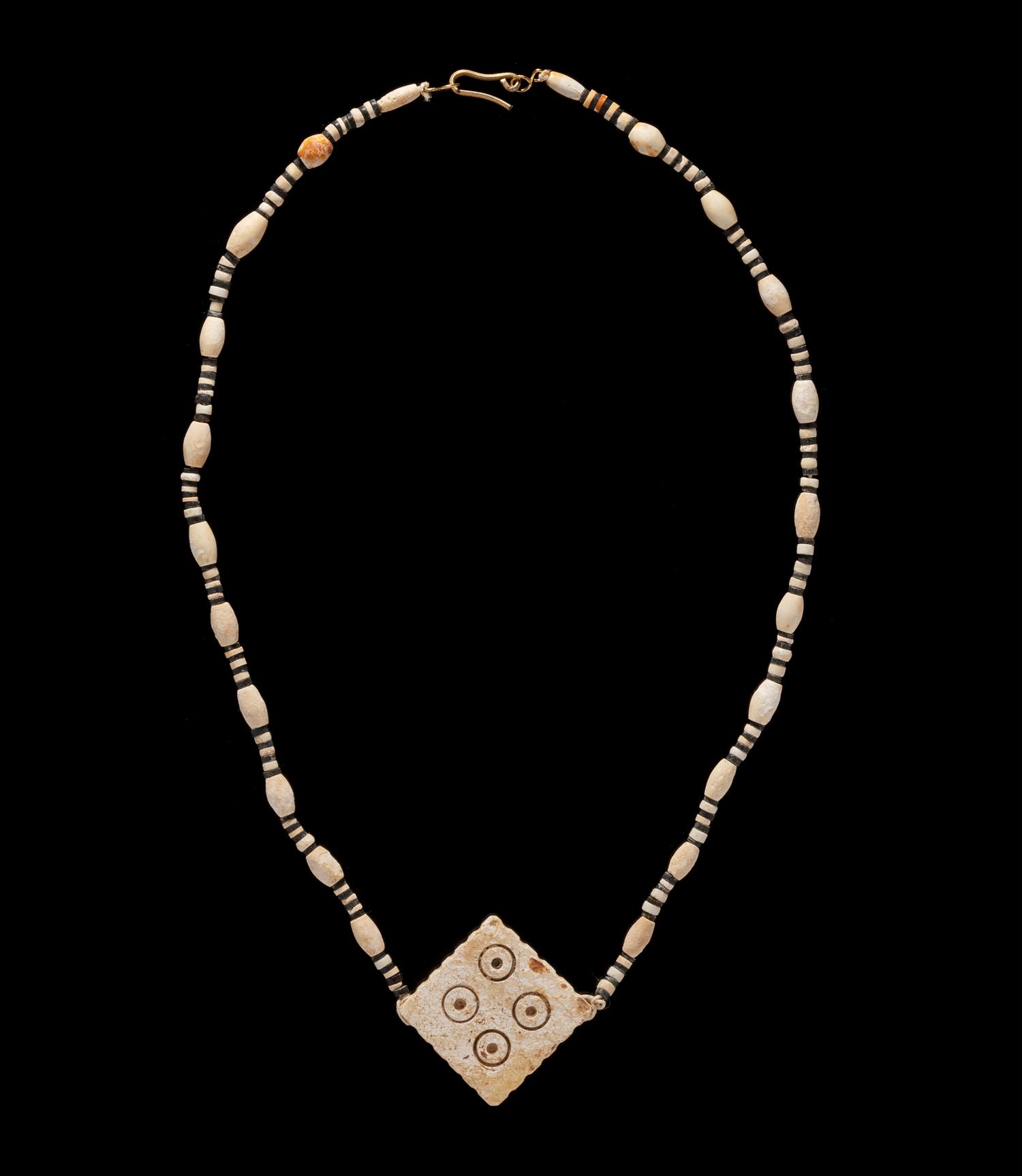 A Western Asiatic Stone and Shell Bead Necklace