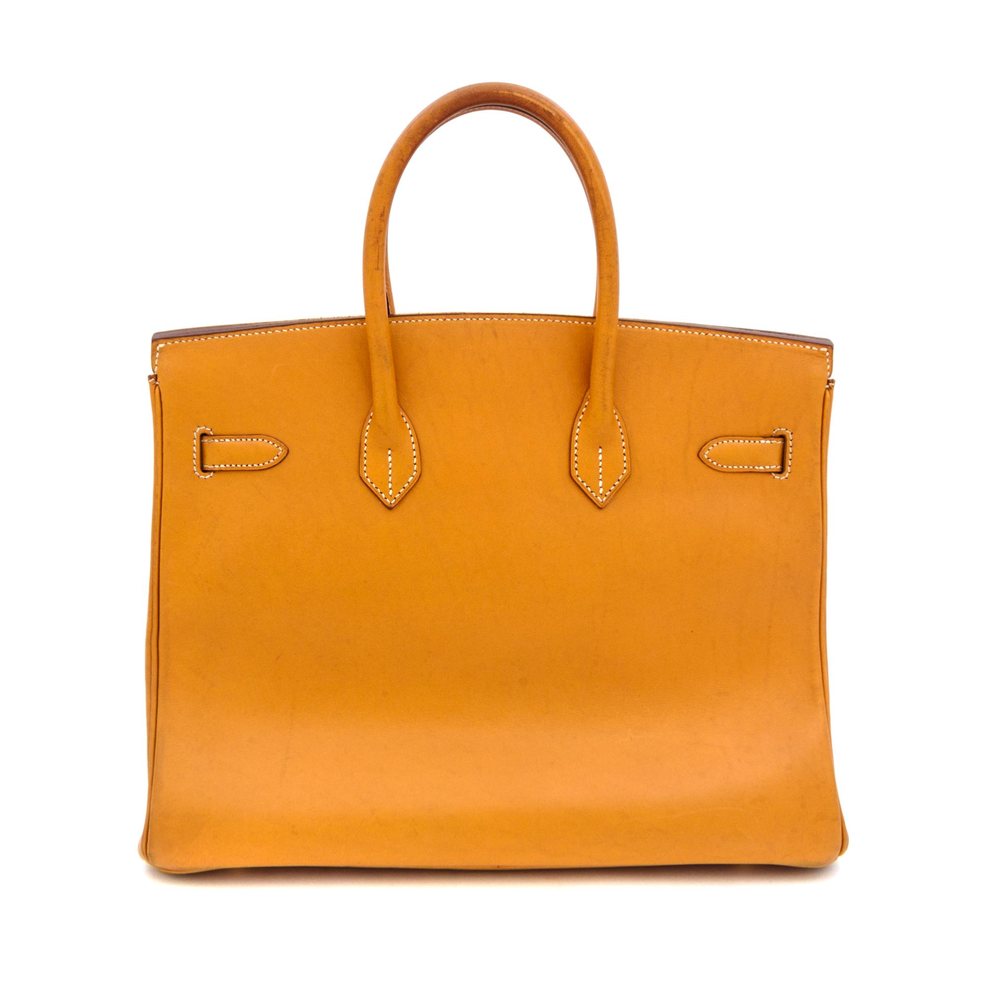 An Hermes Tan Leather 35cm Birkin Handbag, 13.5" x 11" x 7".