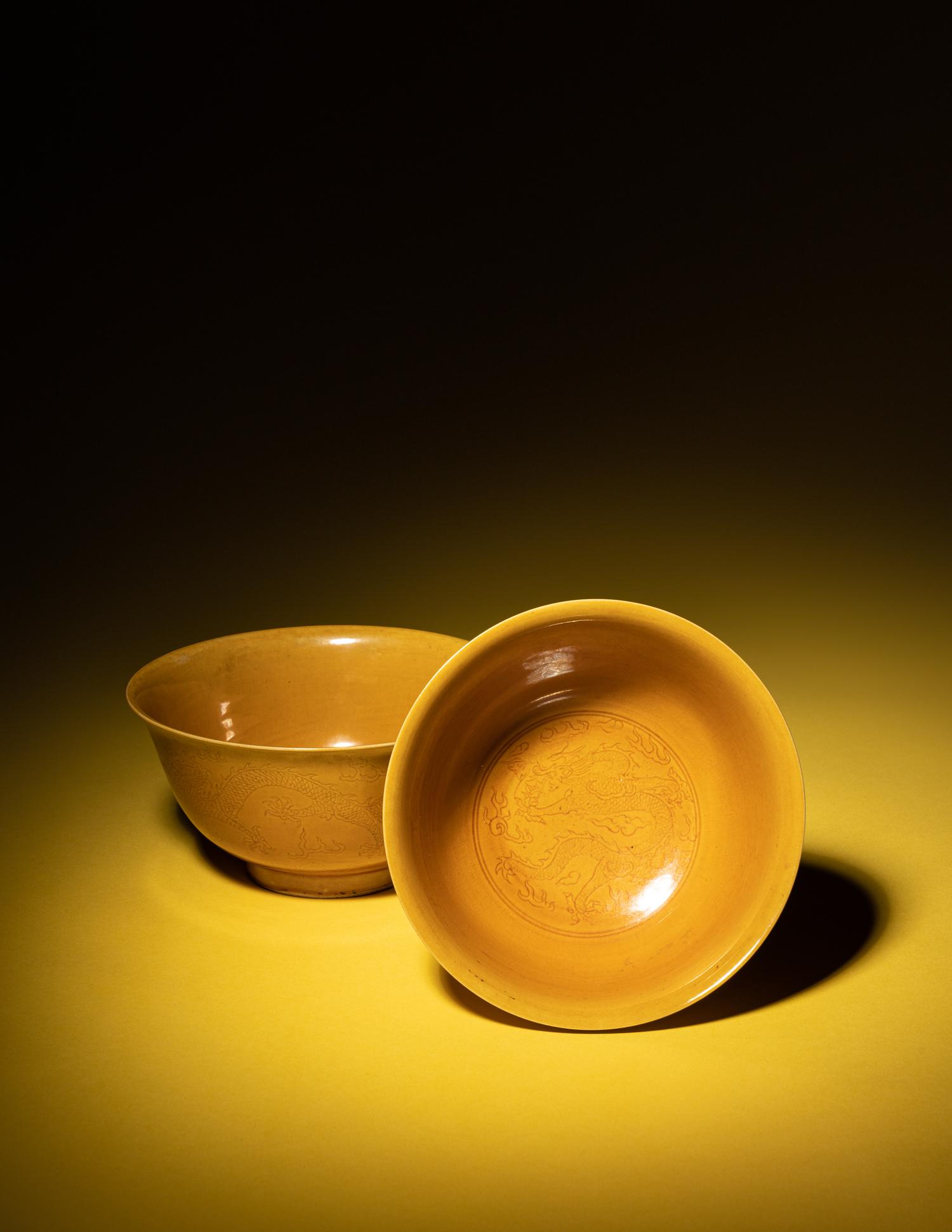 A Pair of Incised Yellow Glazed Porcelain 'Dragon' Bowls