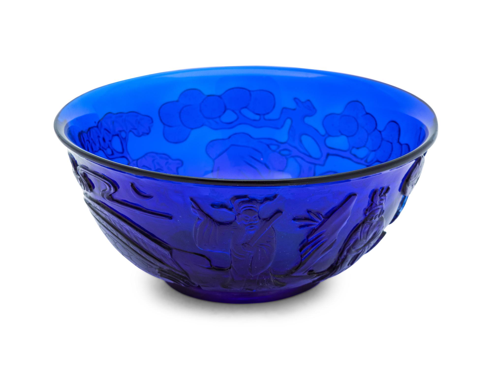 A Chinese Carved Transparent Blue Glass Bowl