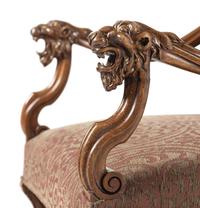A Pair of French Carved Walnut Fauteuils