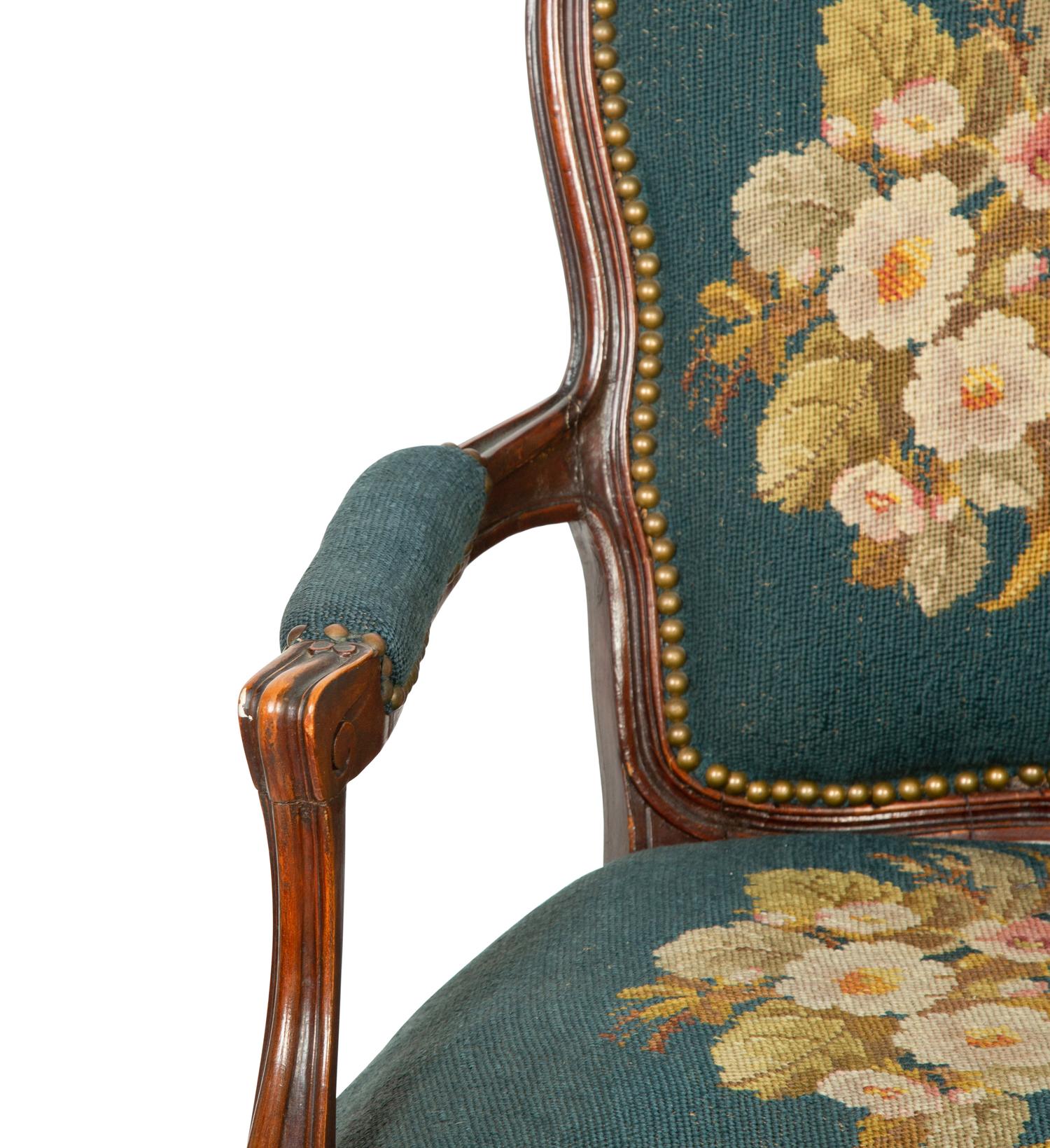 A Pair of Louis XV Style Walnut Fauteuils