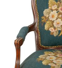 A Pair of Louis XV Style Walnut Fauteuils