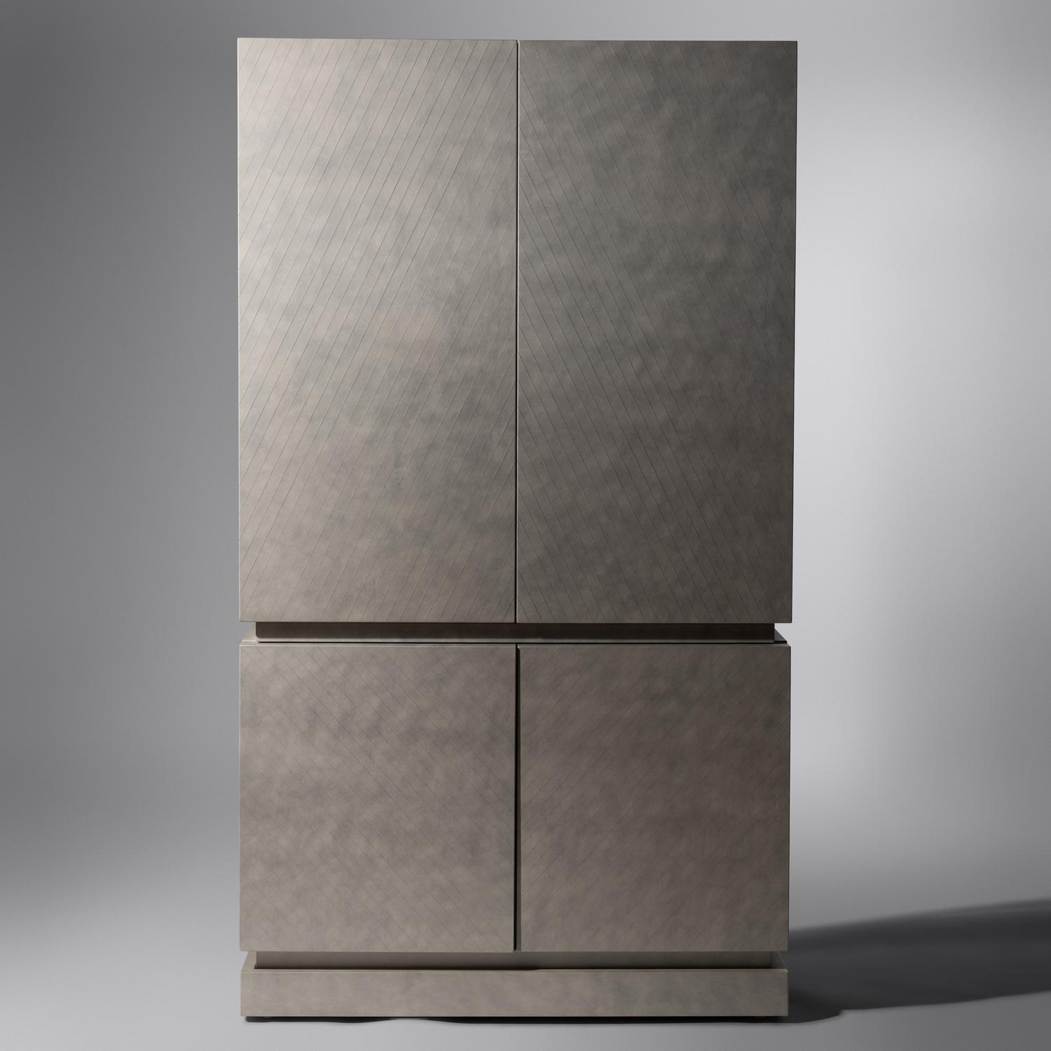 Custom cabinet in scored leather finish, 1987