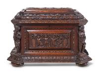 A Renaissance Revival Carved Oak Cellarette