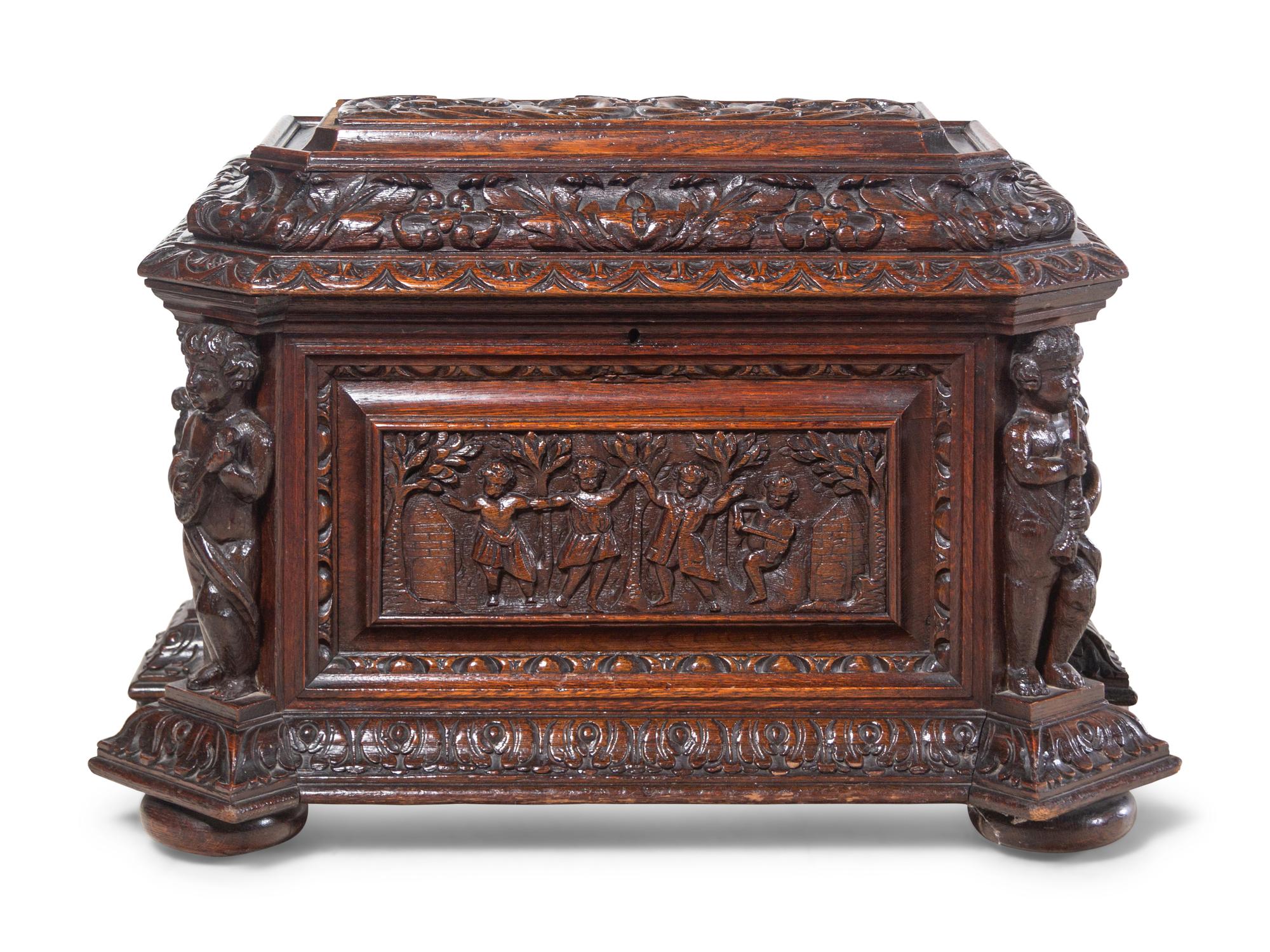 A Renaissance Revival Carved Oak Cellarette