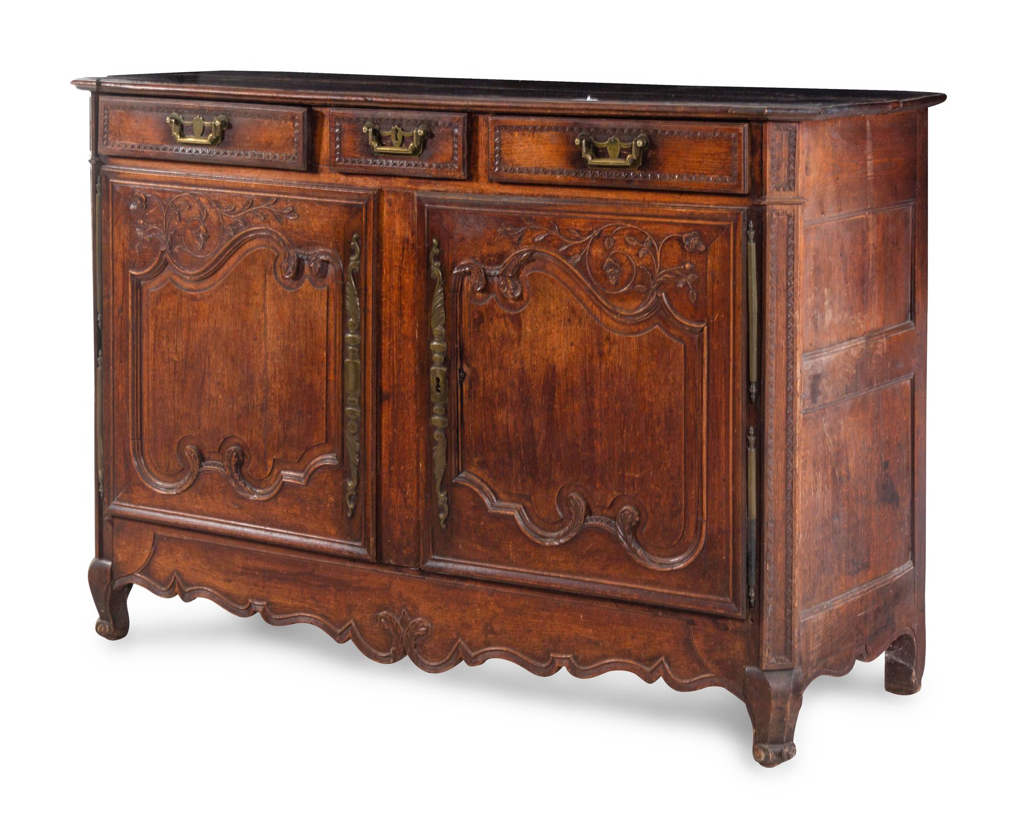 A French Provincial Carved Oak Cabinet