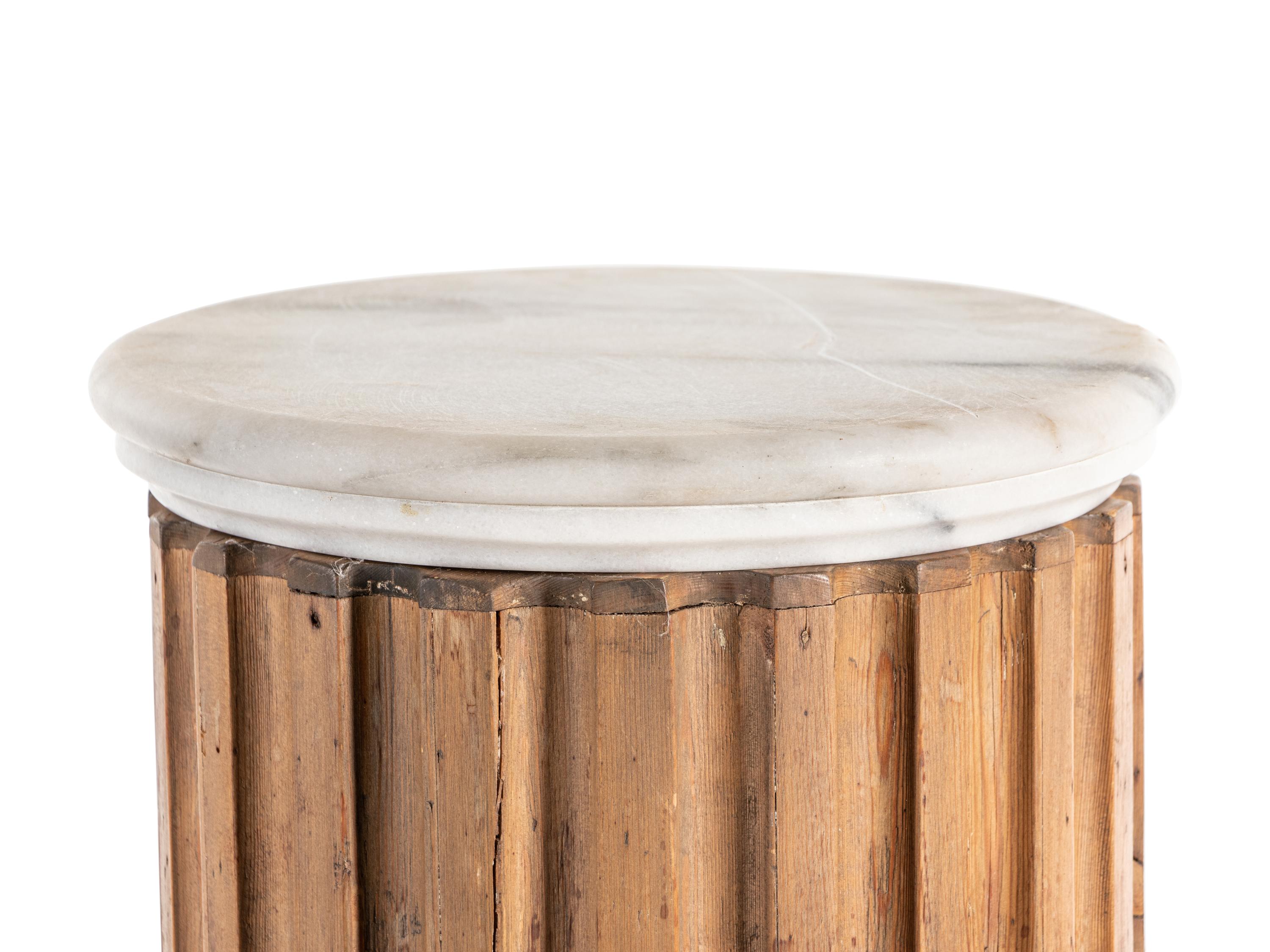 A Pair of Carved Pine Pedestals with Marble Tops