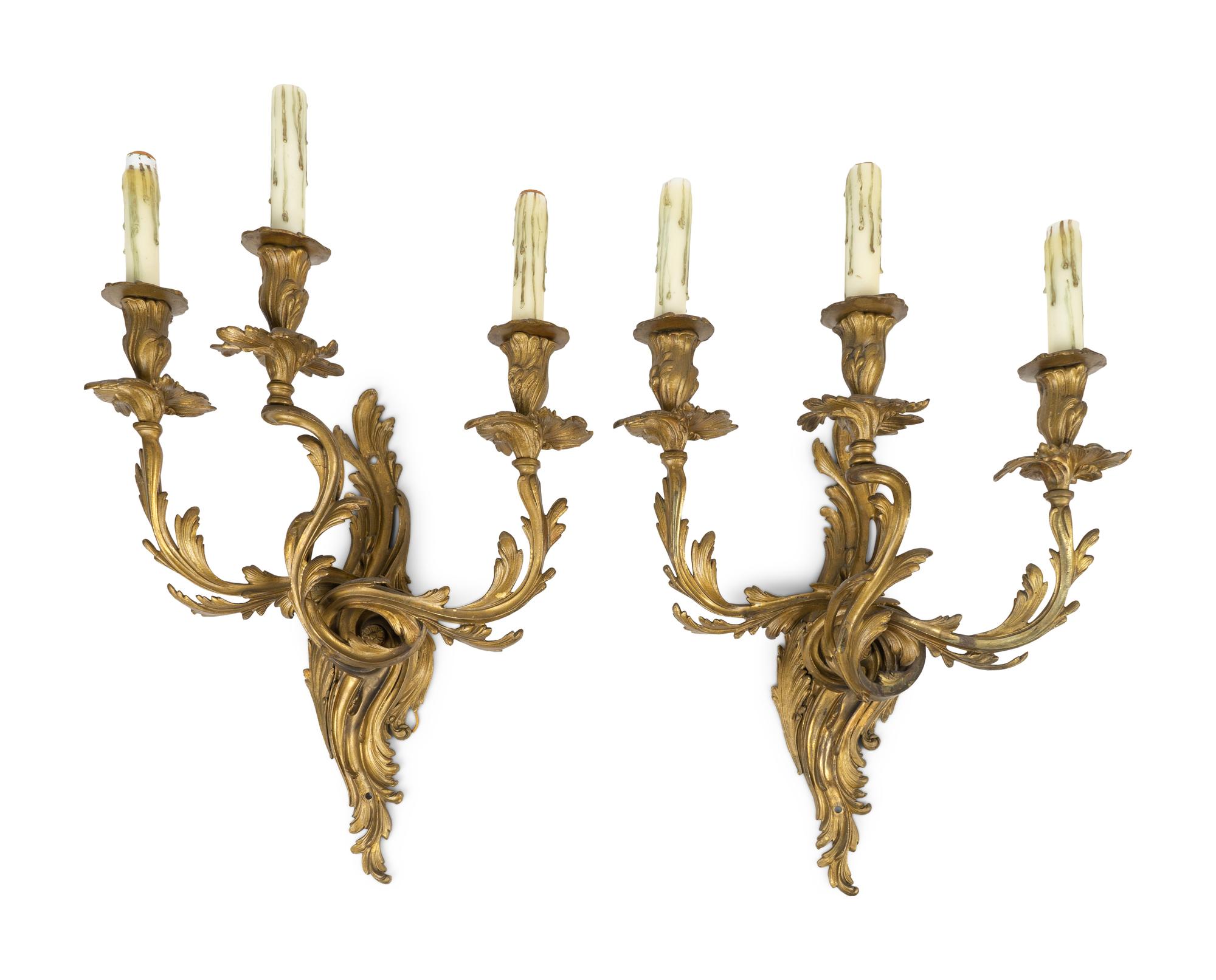 A Pair of Louis XV Style Gilt Bronze Three-Light Wall Sconces — 19TH/20TH CENTURY