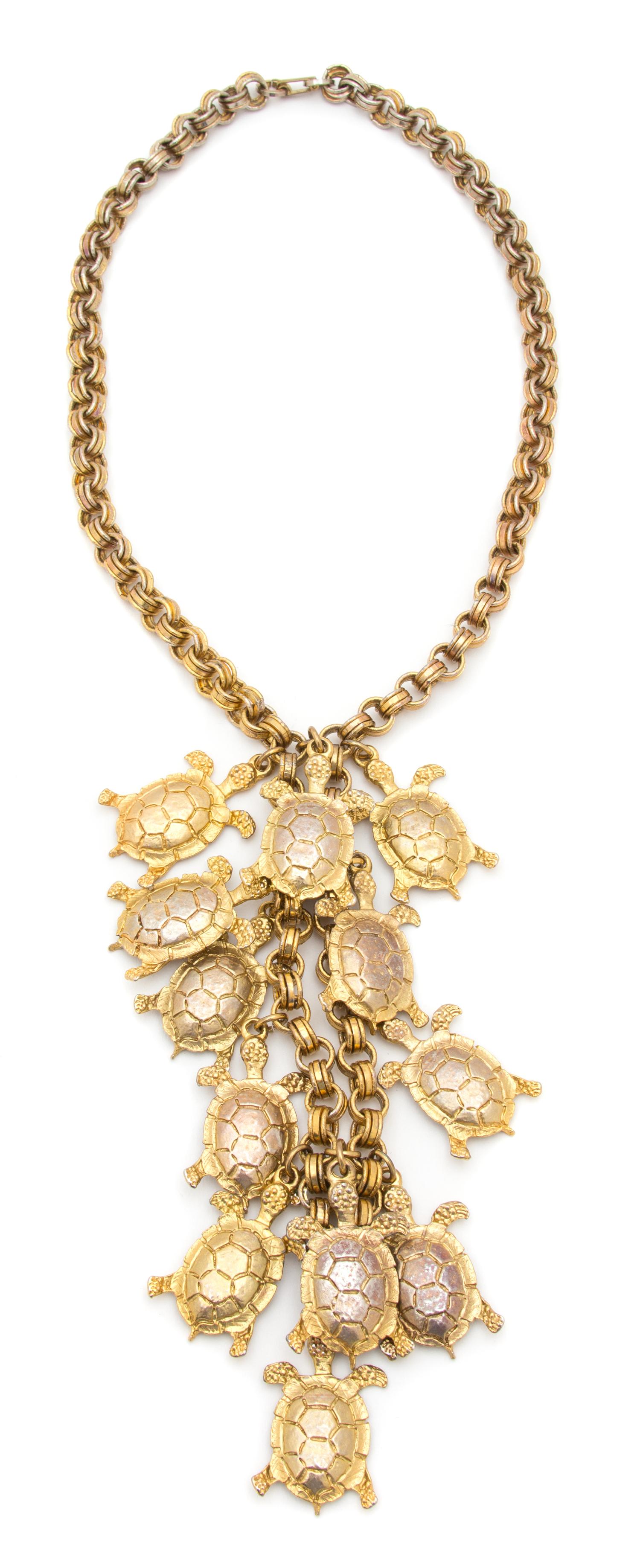 A Goldtone Turtle Necklace, Necklace: 20"; Pendant: 7.5" x 4".