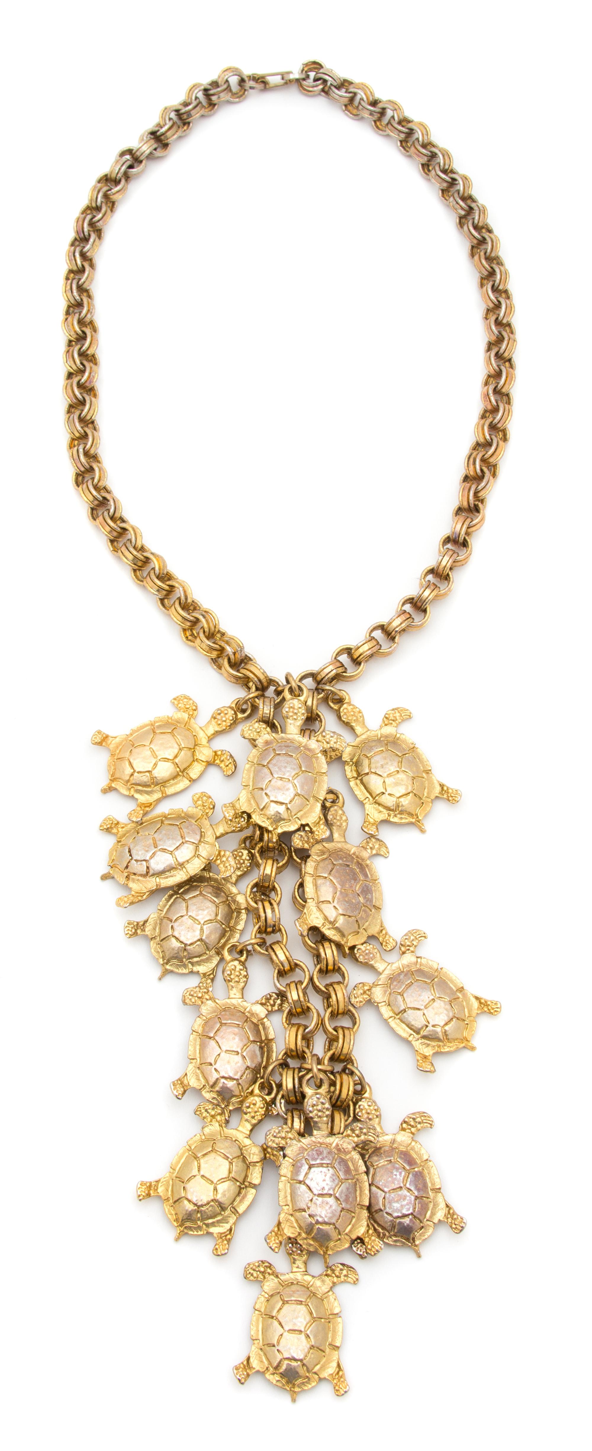 A Goldtone Turtle Necklace, Necklace: 20"; Pendant: 7.5" x 4".