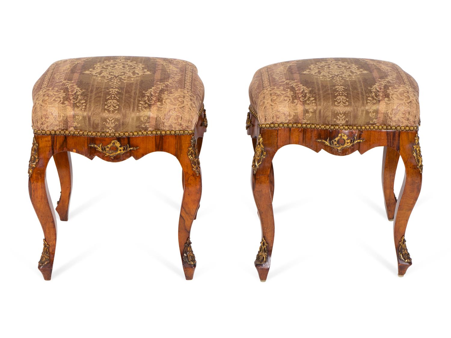 A Pair of Continental Rococo Style Gilt-Metal-Mounted Walnut Tabourets