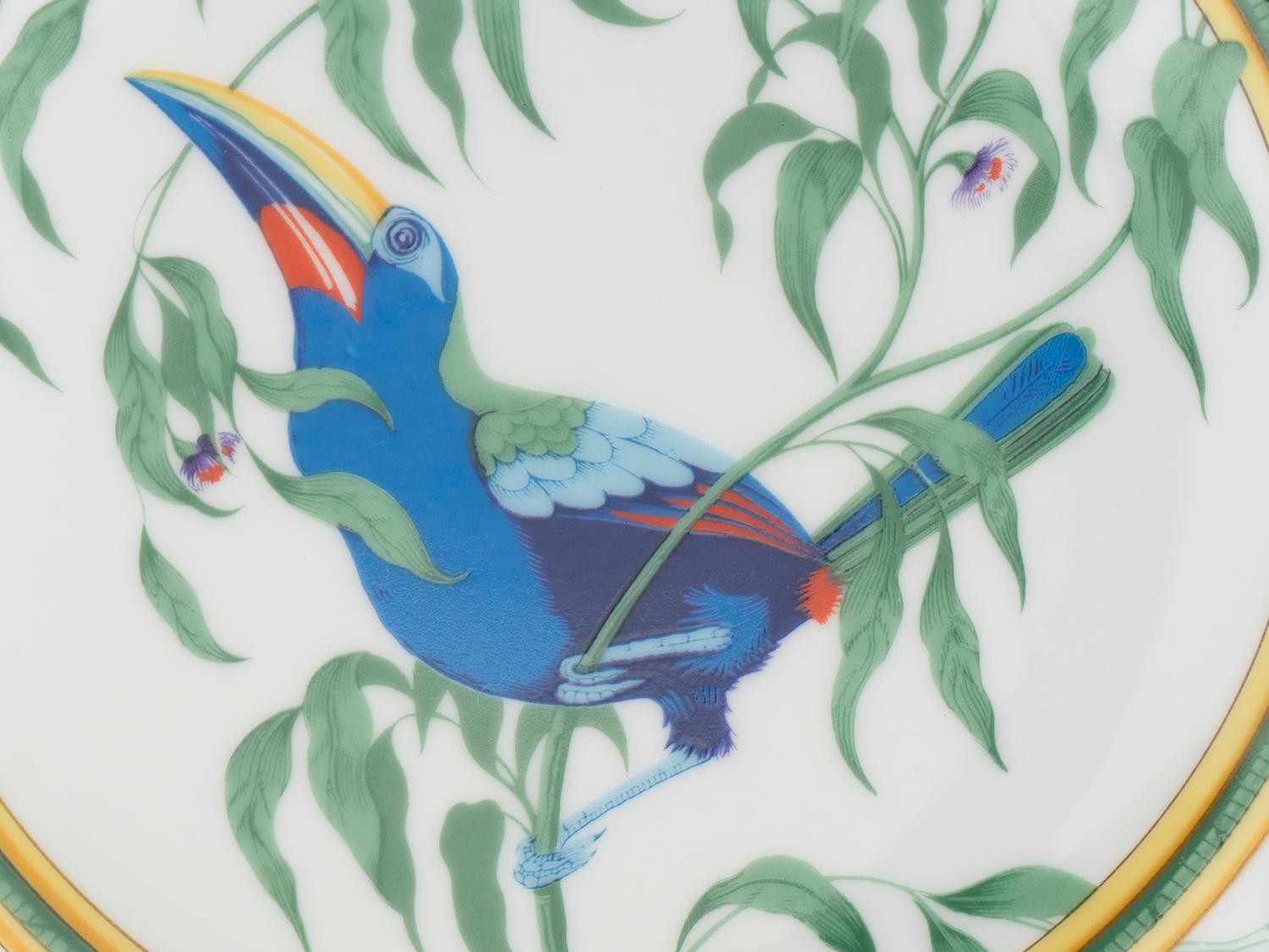 An Hermès Toucans Porcelain Dinner Service