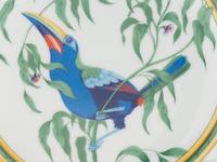 An Hermès Toucans Porcelain Dinner Service